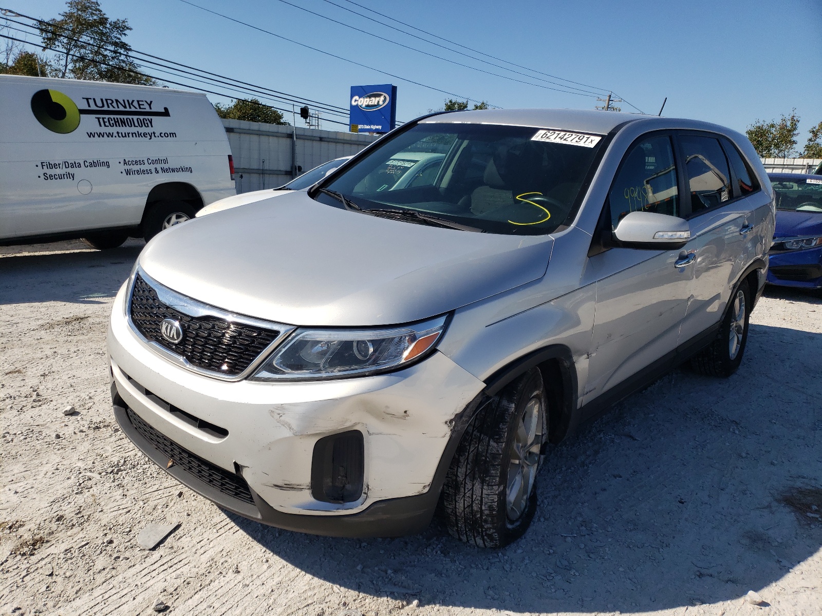 Photo 2 from auction – 2014 KIA SORENTO LX with VIN 5XYKT3A65EG521964