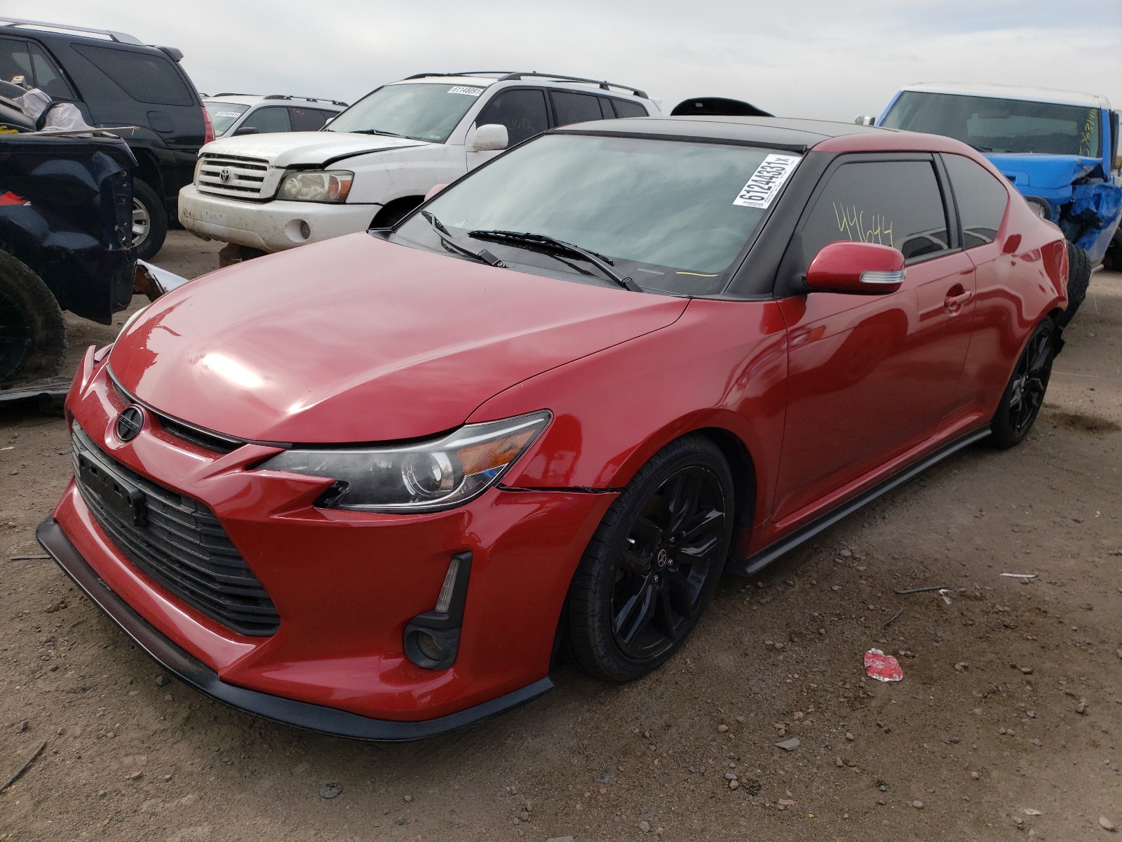 Photo 2 from auction – 2016 TOYOTA SCION TC with VIN JTKJF5C72GJ025584