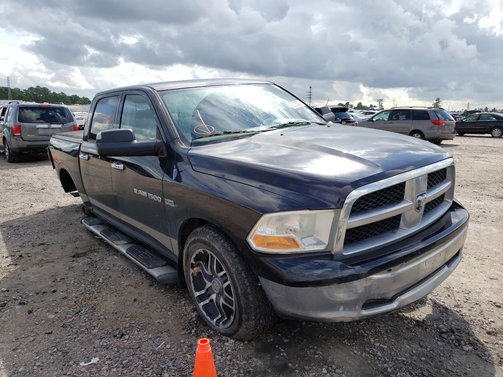 DODGE RAM 1500 2011 with VIN 1D7RV1CT5BS518929 - Photo from auction
