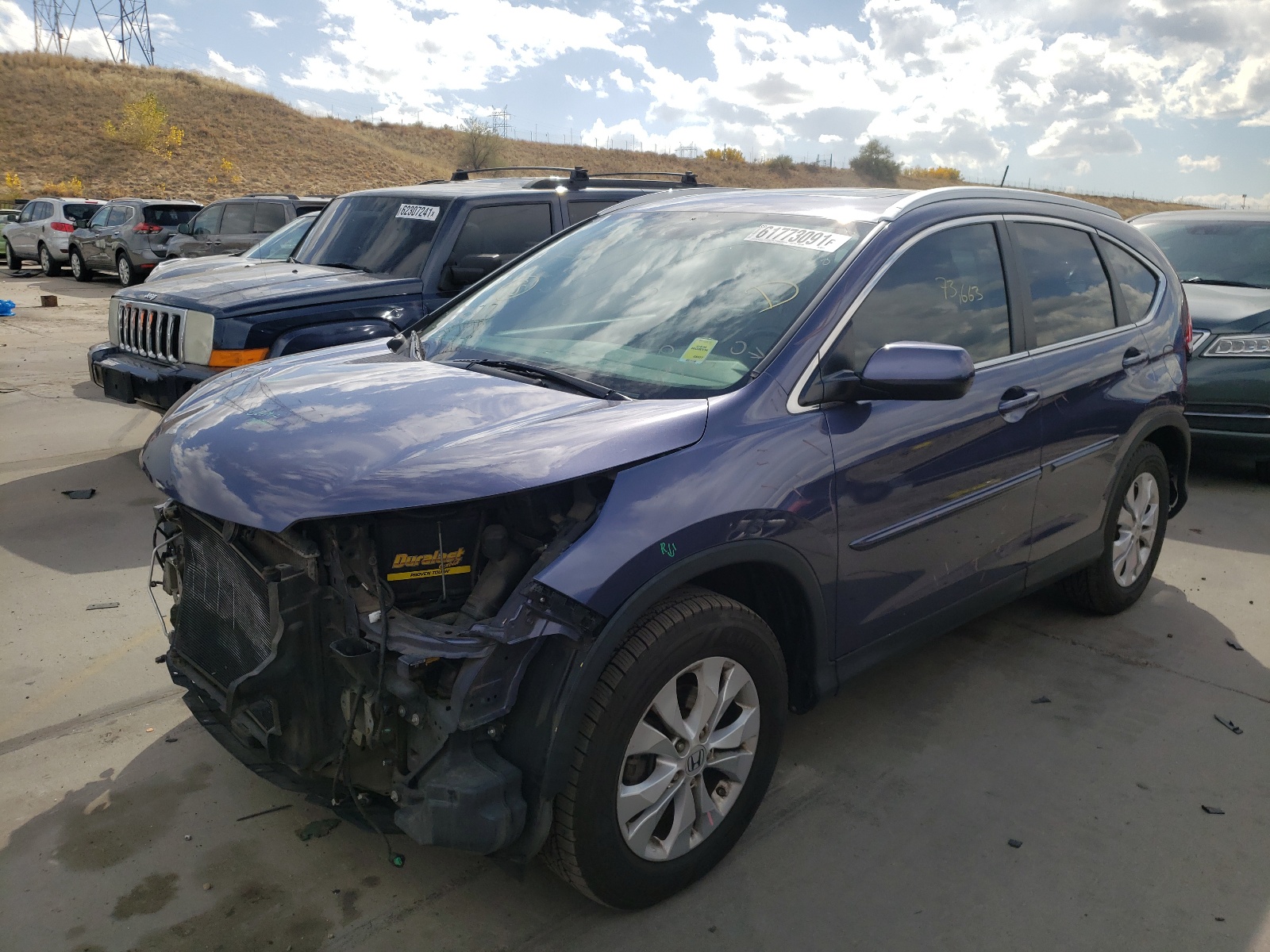 Photo 2 from auction – 2013 HONDA CR-V EXL with VIN 5J6RM4H74DL063573