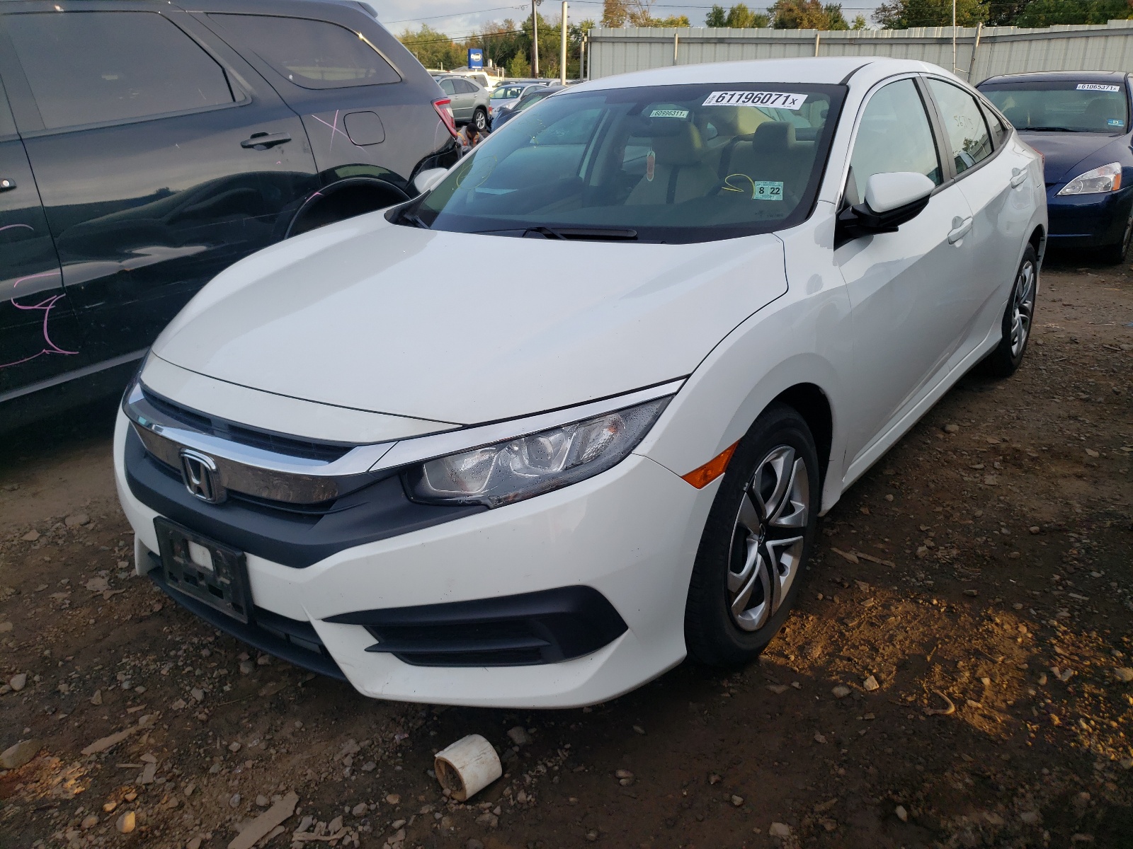 Photo 2 from auction – 2017 HONDA CIVIC LX with VIN 2HGFC2F51HH533466
