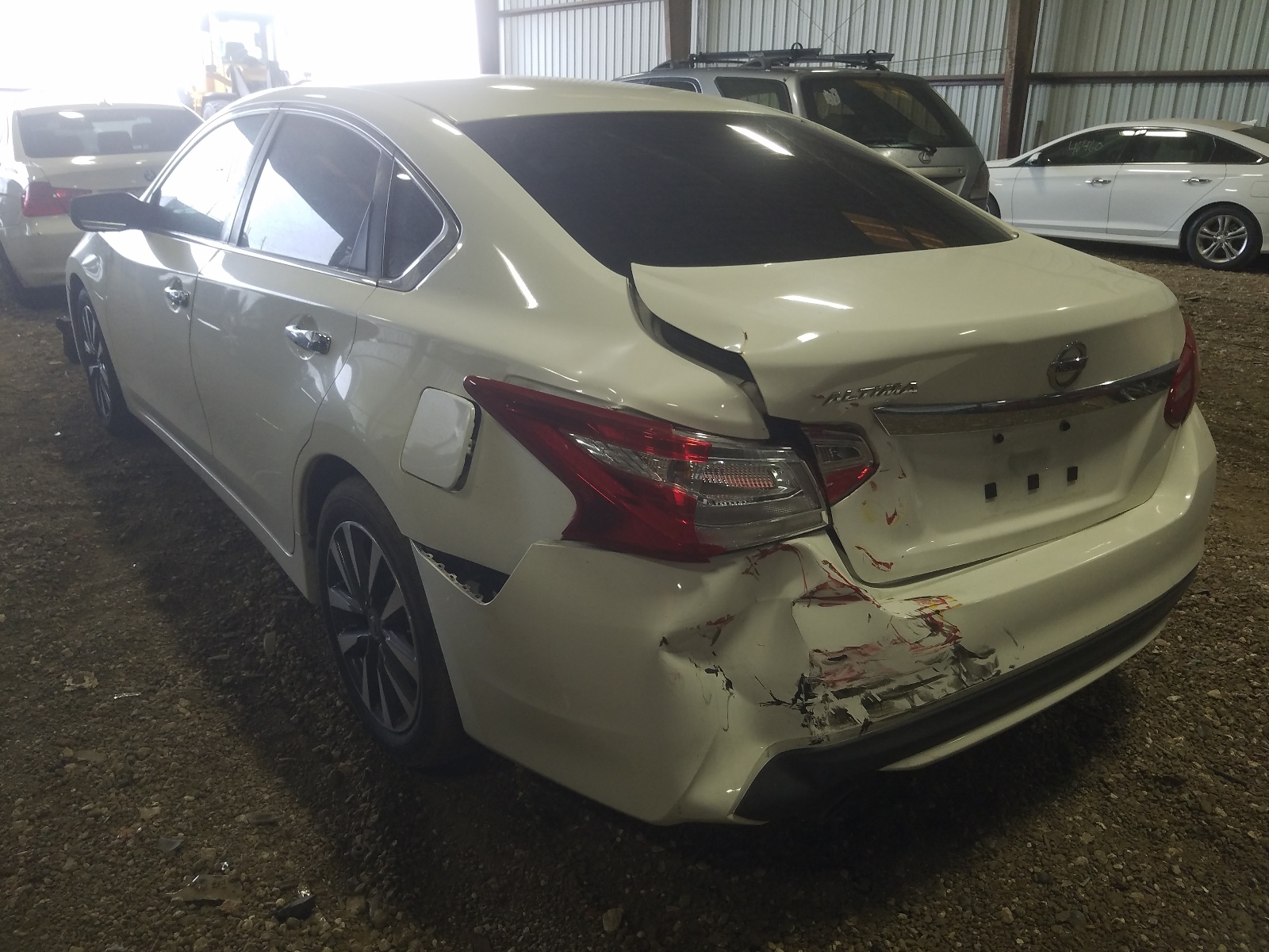 Photo 3 from auction – 2016 NISSAN ALTIMA 2.5 with VIN 1N4AL3AP1GC211957