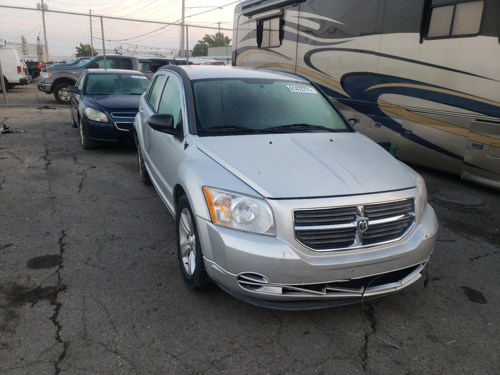 DODGE CALIBER SX 2010 with VIN 1B3CB4HA9AD664143 - Photo from auction