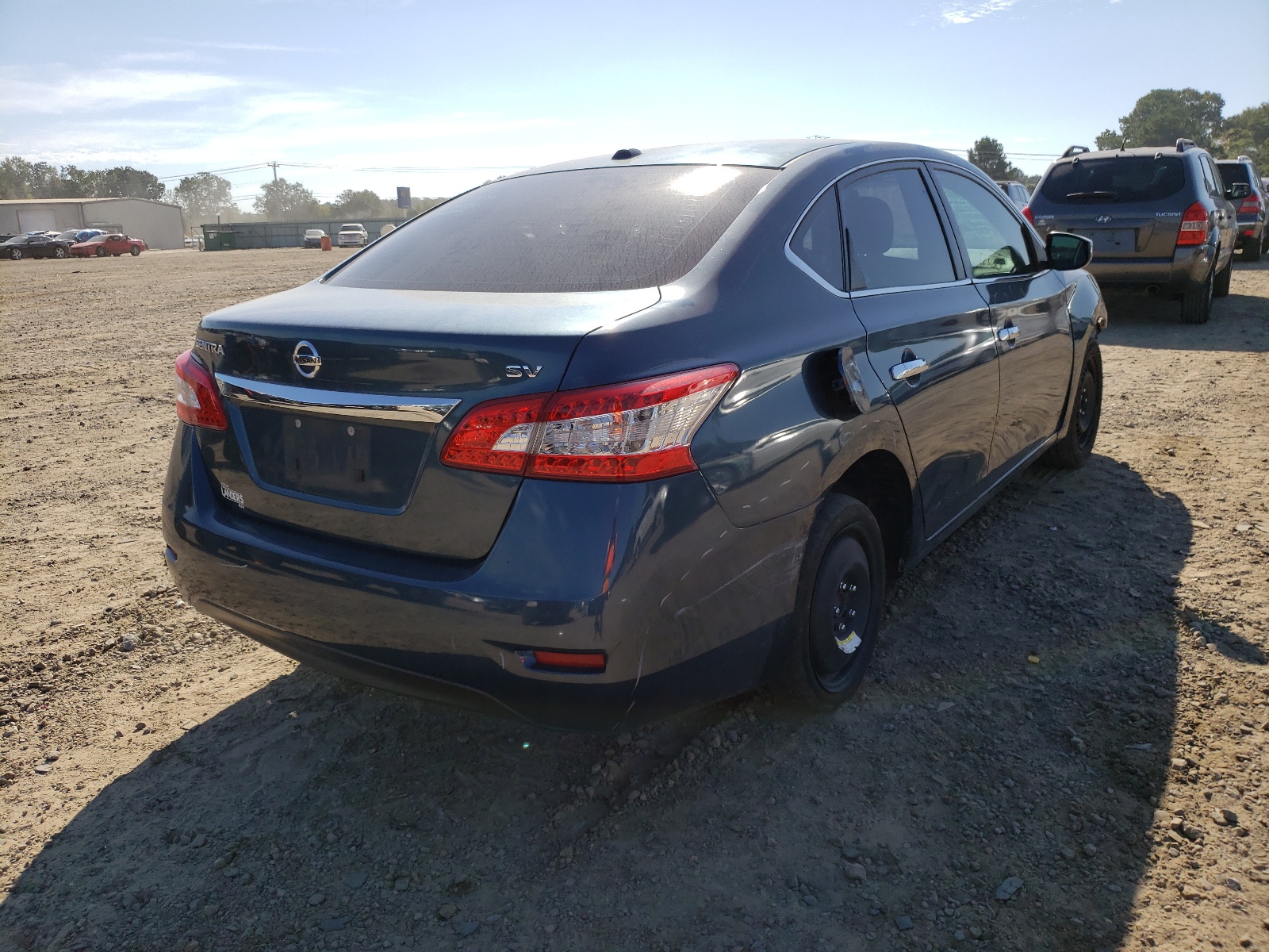 Photo 4 from auction – 2015 NISSAN SENTRA S with VIN 3N1AB7AP2FY217022