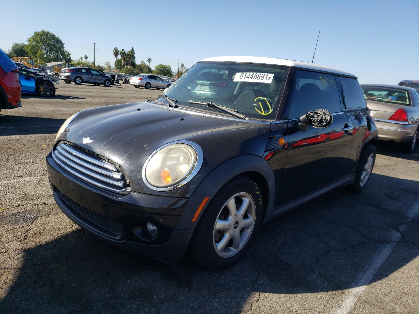 Photo 2 from auction – 2010 MINI COOPER with VIN WMWMF3C57ATZ24277