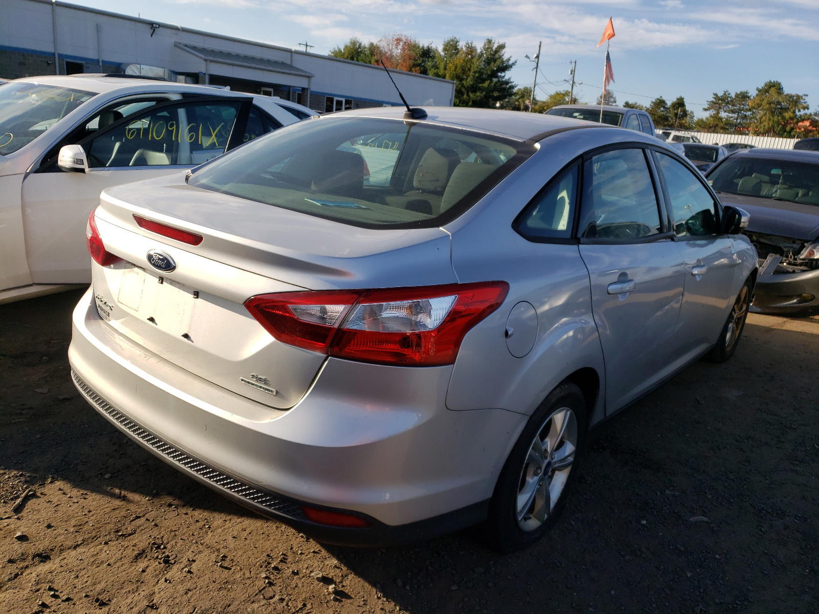 Photo 4 from auction – 2014 FORD FOCUS SE with VIN 1FADP3F20EL150497