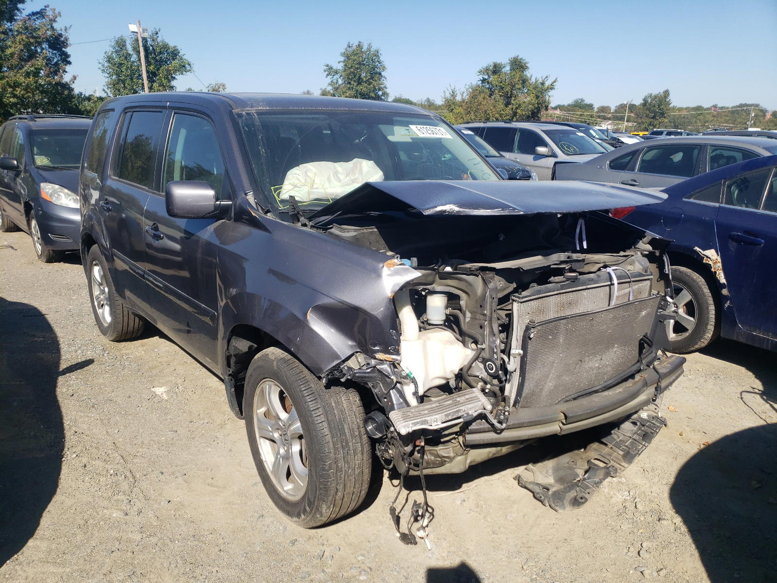HONDA PILOT EXL 2015 with VIN 5FNYF4H50FB023717 - Photo from auction