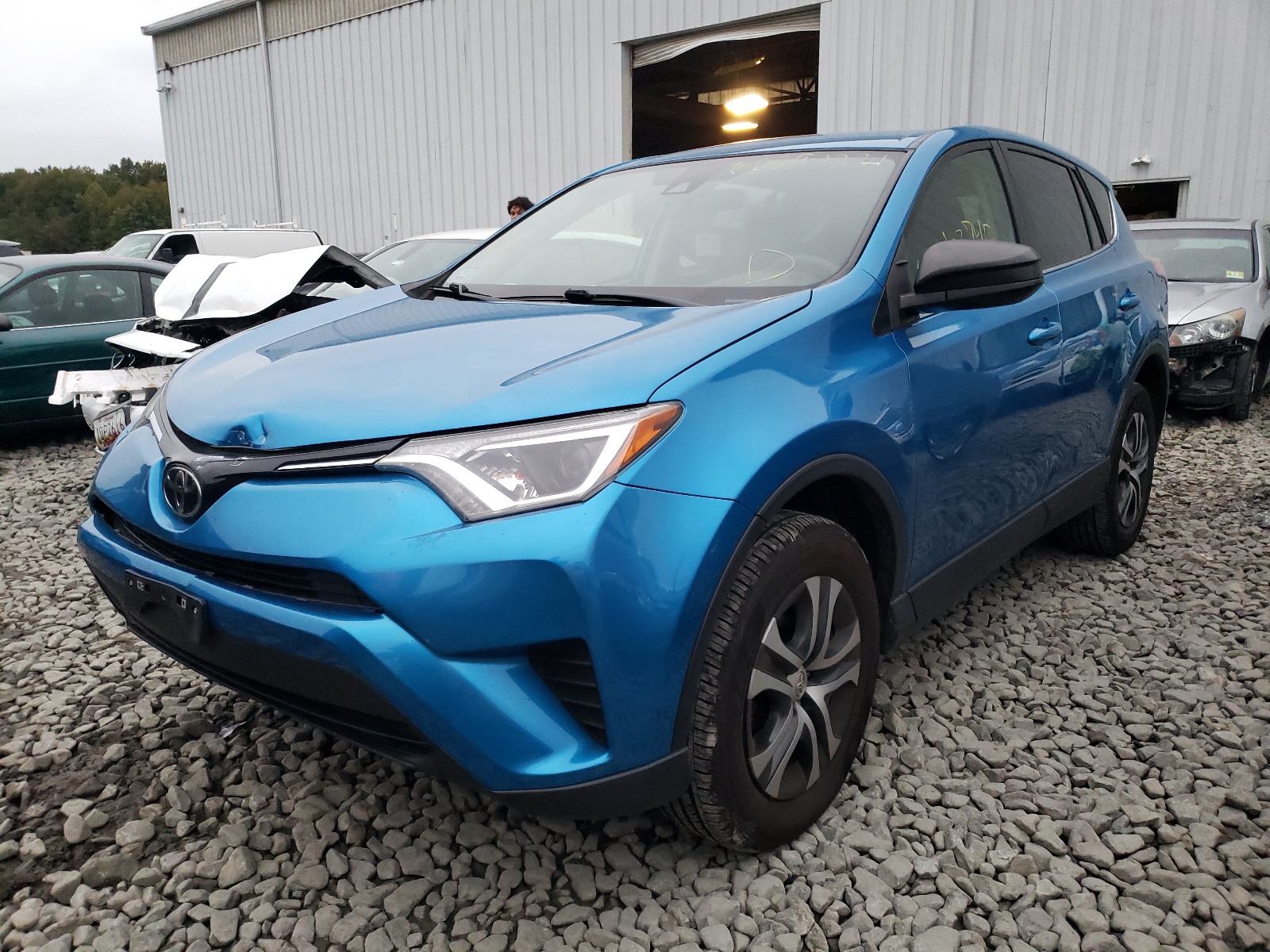 Photo 2 from auction – 2017 TOYOTA RAV4 LE with VIN JTMBFREV0HJ164127