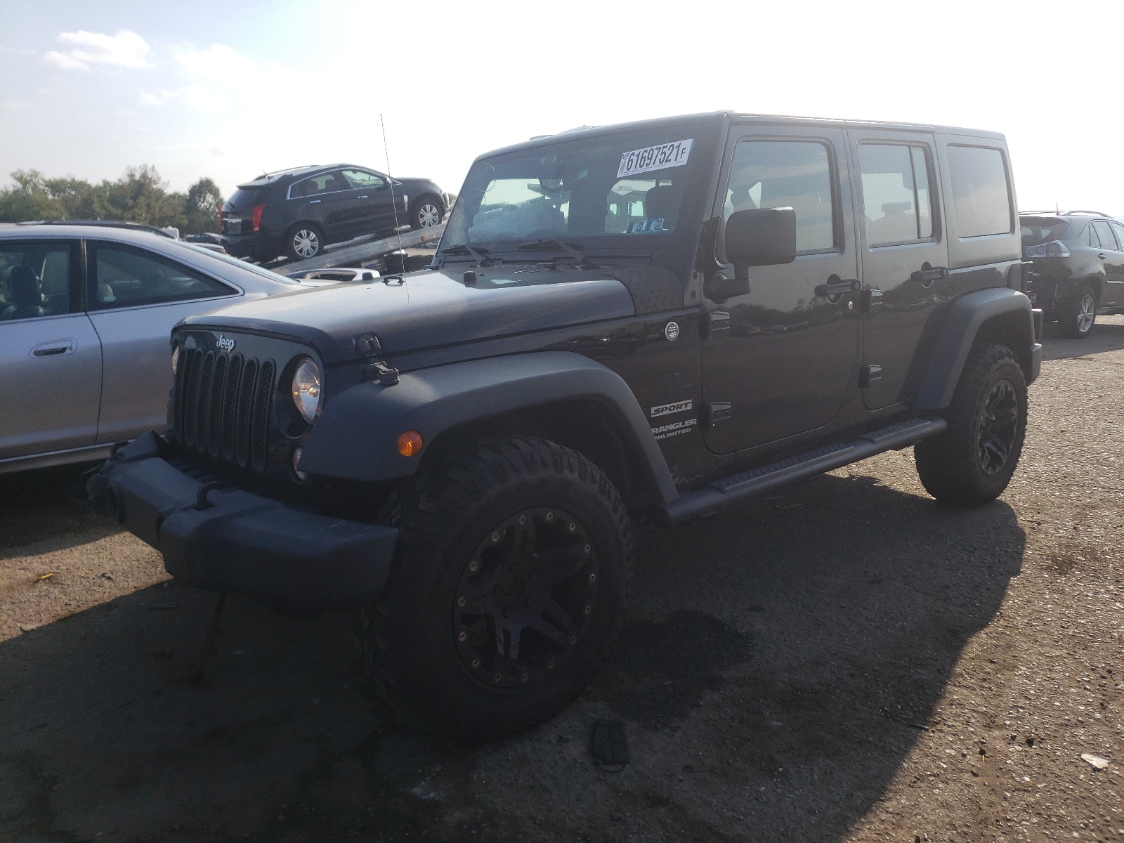 Photo 2 from auction – 2015 JEEP WRANGLER U with VIN 1C4BJWDG0FL682725