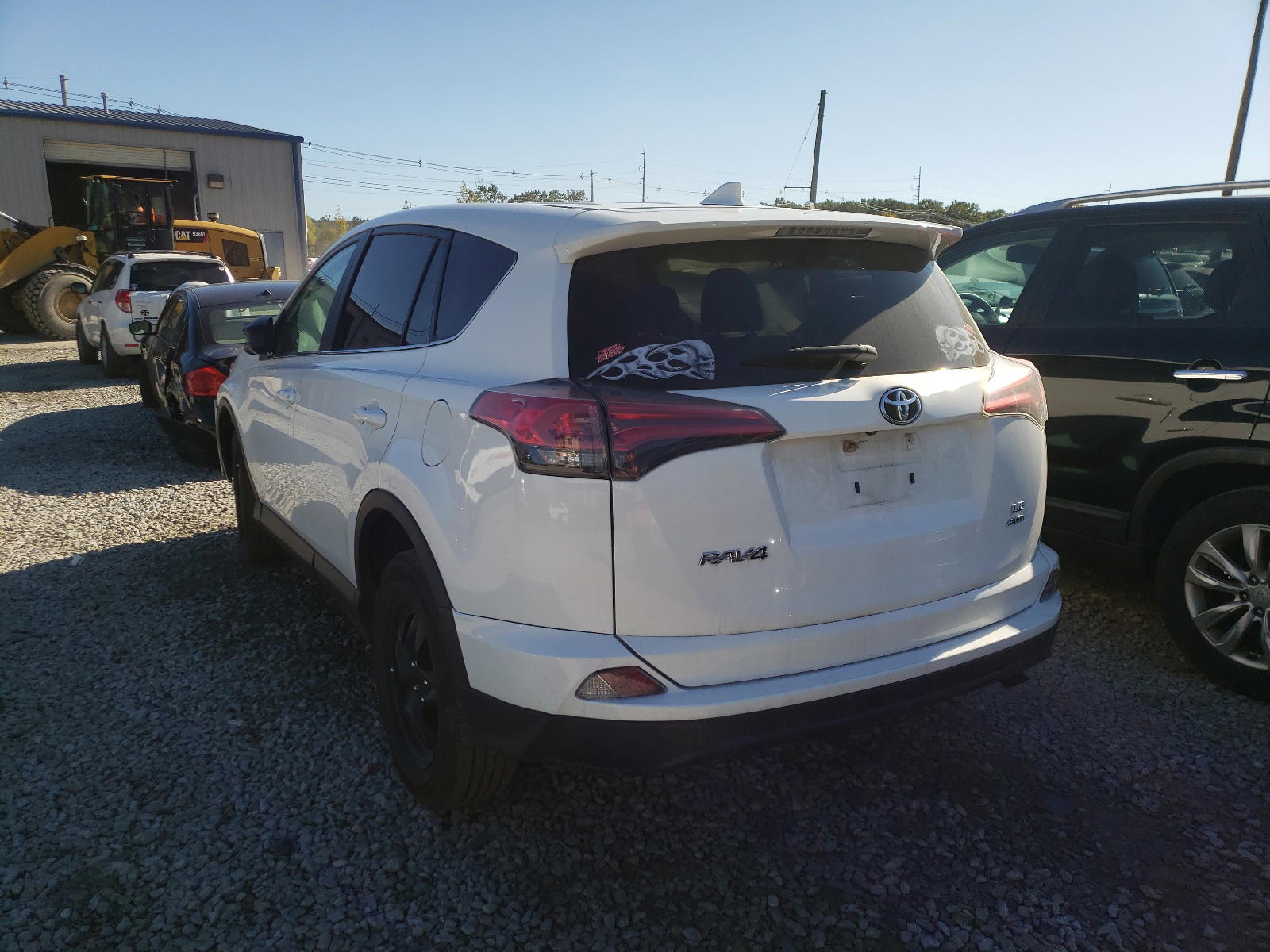 Photo 3 from auction – 2018 TOYOTA RAV4 LE with VIN 2T3BFREV7JW765008