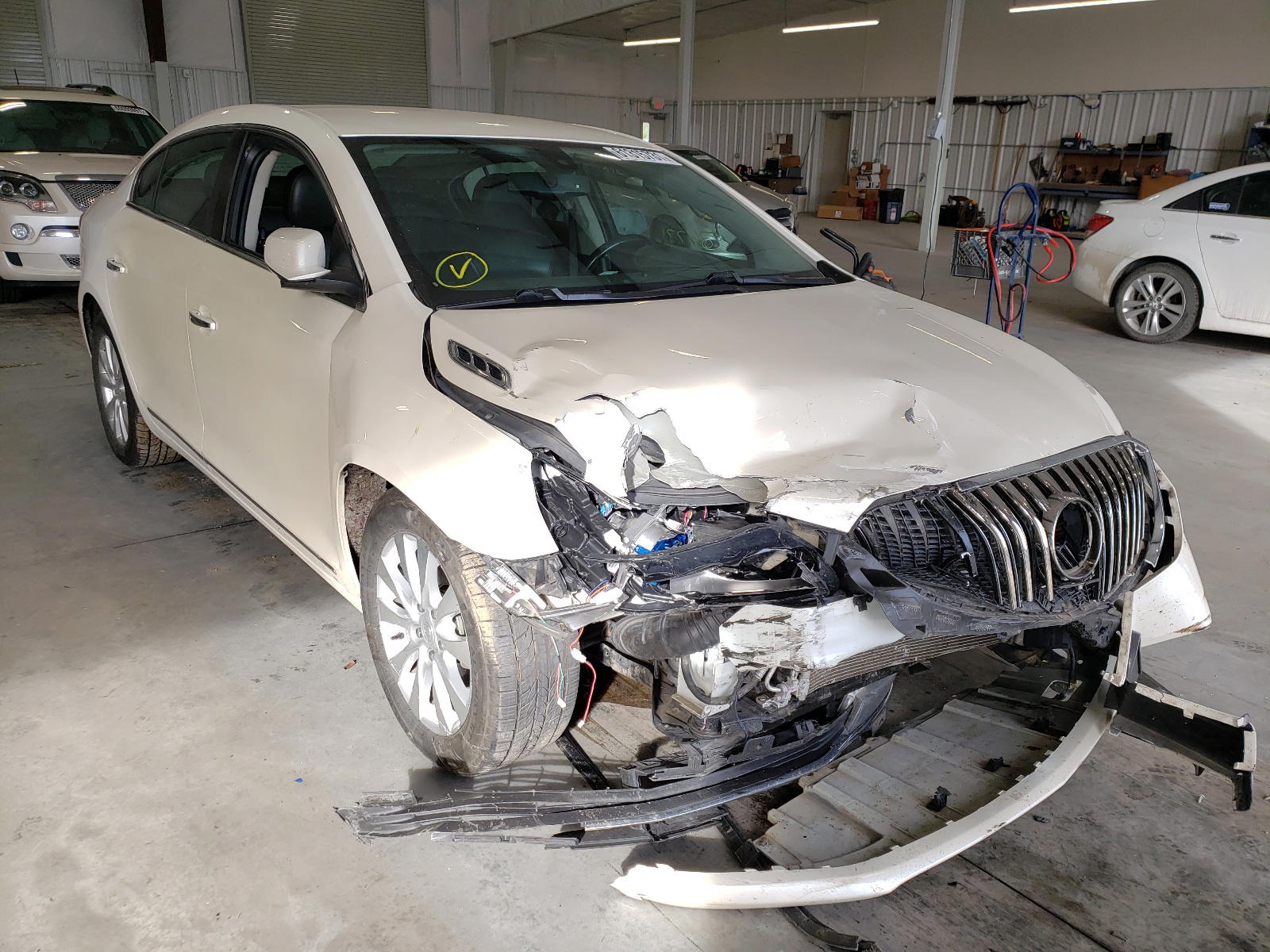 BUICK LACROSSE 2014 with VIN 1G4GB5GR7EF102728 - Photo from auction