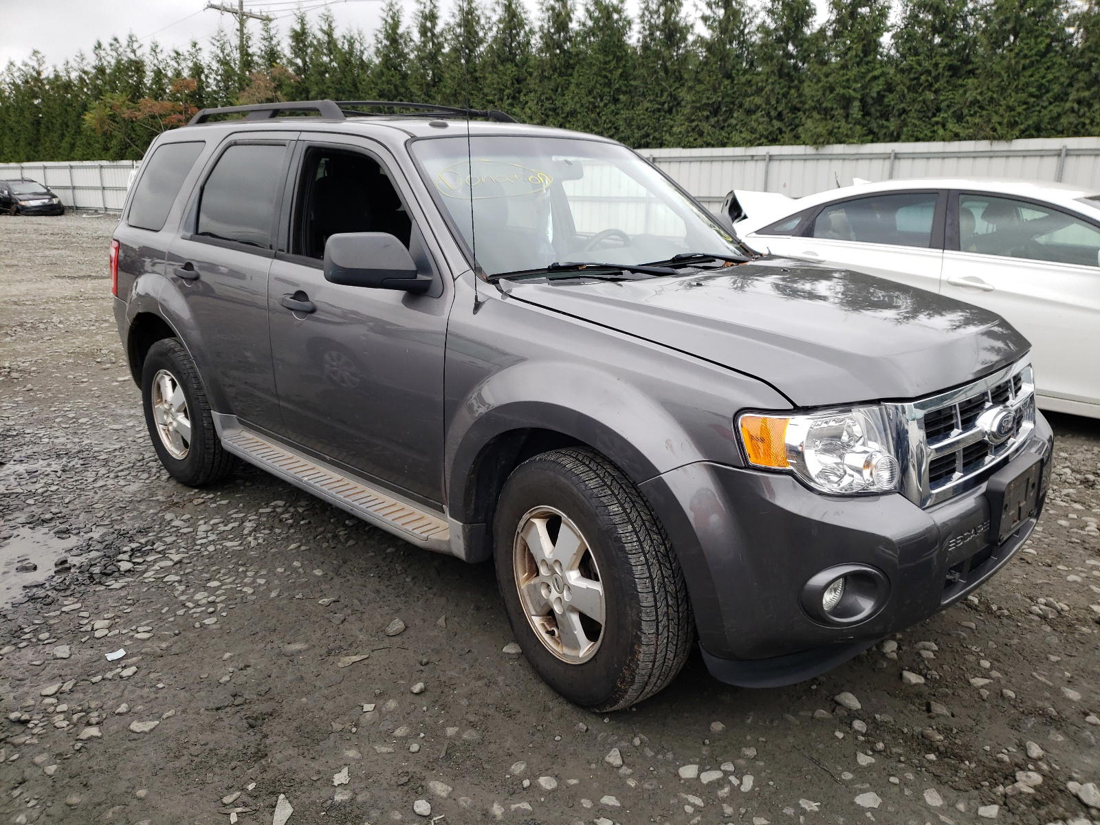 FORD ESCAPE XLT 2011 with VIN 1FMCU0DG4BKA30758 - Photo from auction
