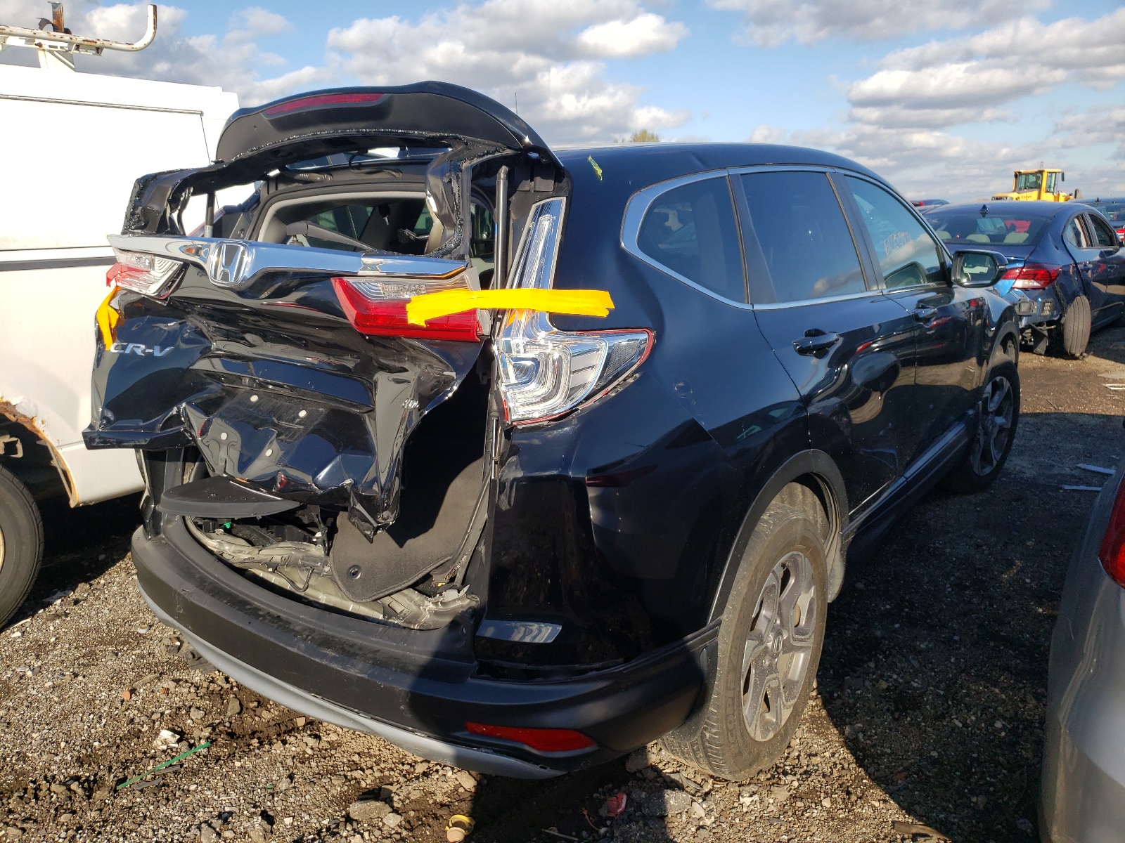 Photo 4 from auction – 2018 HONDA CR-V EX with VIN 7FARW2H54JE030479