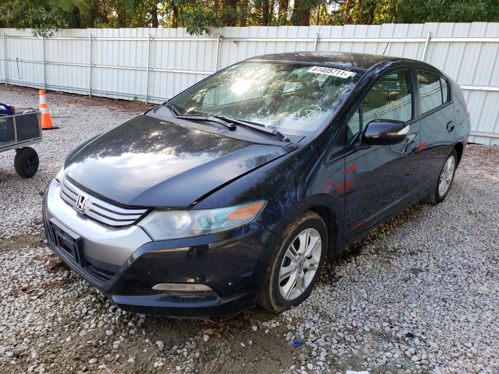 Photo 2 from auction – 2010 HONDA INSIGHT EX with VIN JHMZE2H7XAS041133