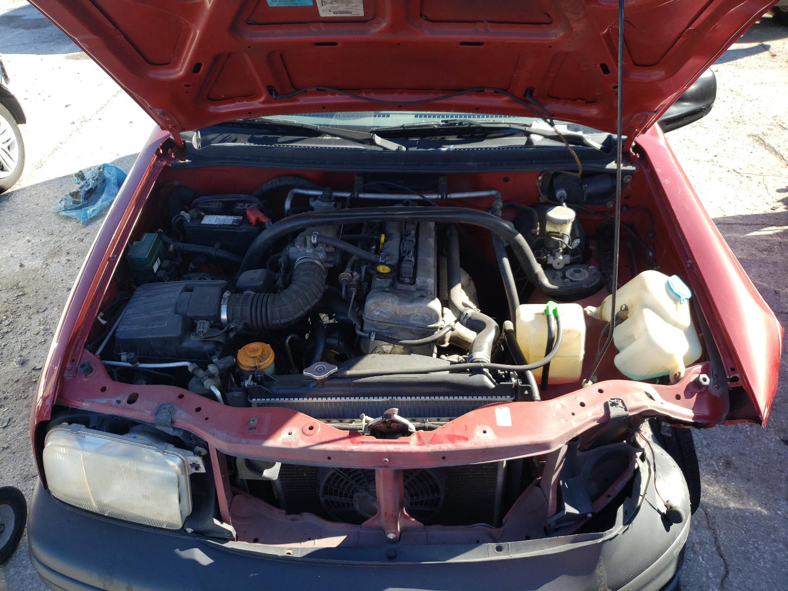 Photo 7 from auction – 1999 CHEVROLET TRACKER with VIN 2CNBJ13C5X6907504