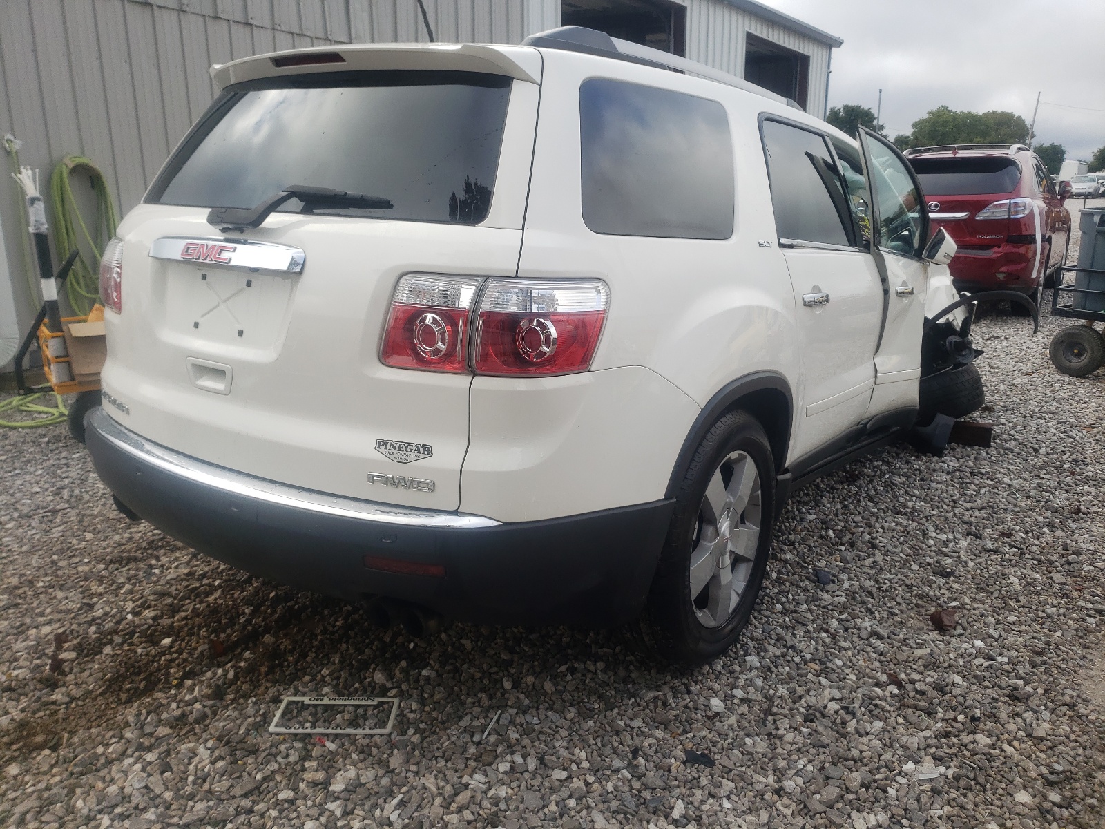 Photo 17 from auction – 2010 GMC ACADIA SLT with VIN 1GKLVMED9AJ213014
