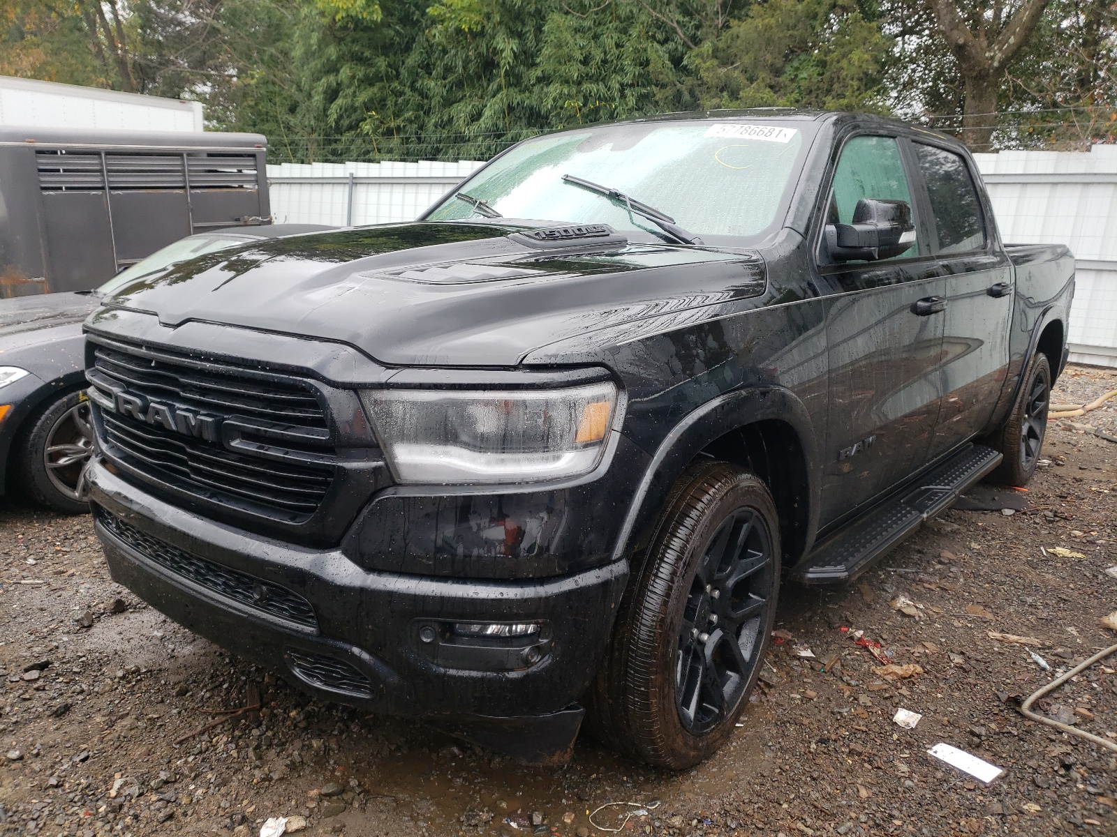 Photo 2 from auction – 2021 RAM 1500 LARAM with VIN 1C6SRFJT1MN734186