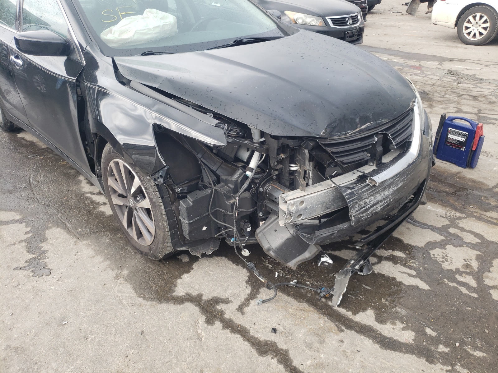 Photo 9 from auction – 2016 NISSAN ALTIMA 2.5 with VIN 1N4AL3AP9GC140474