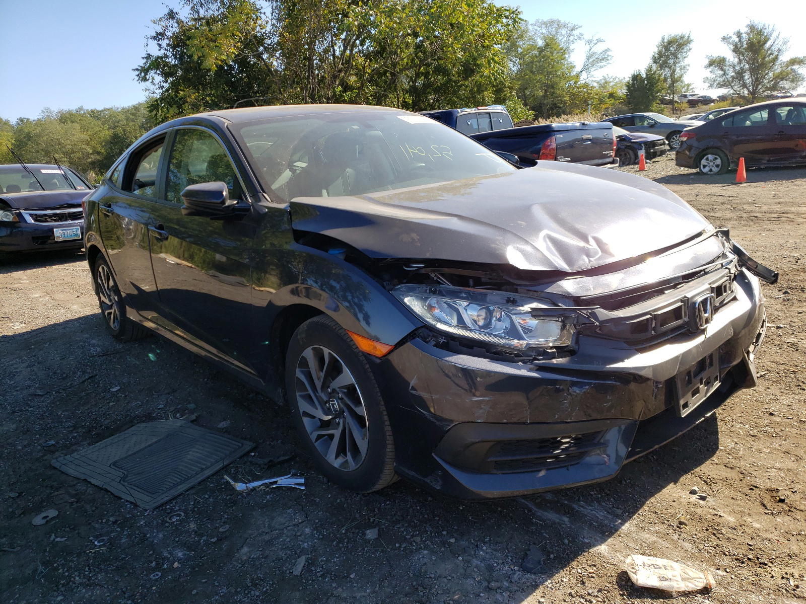 HONDA CIVIC EX 2017 with VIN 2HGFC2F70HH556898 - Photo from auction