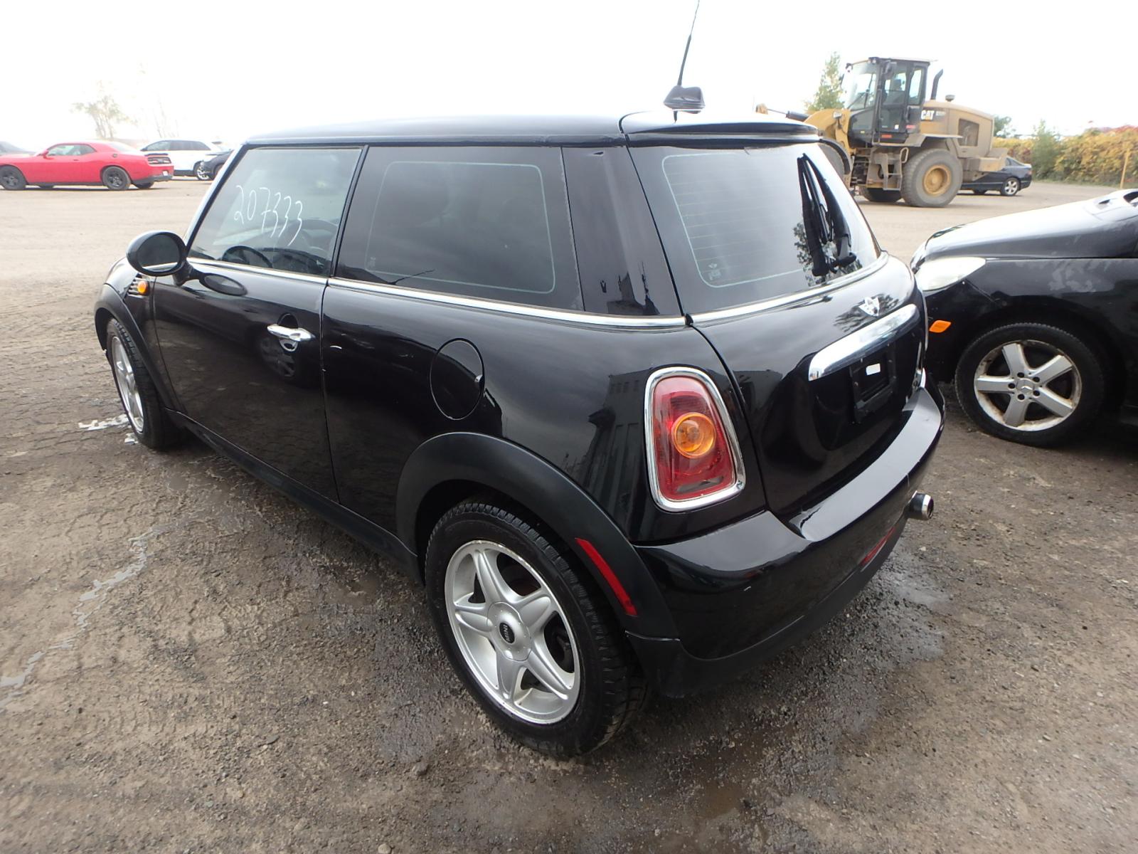 Photo 3 from auction – 2010 MINI COOPER with VIN WMWMF3C51ATZ24047