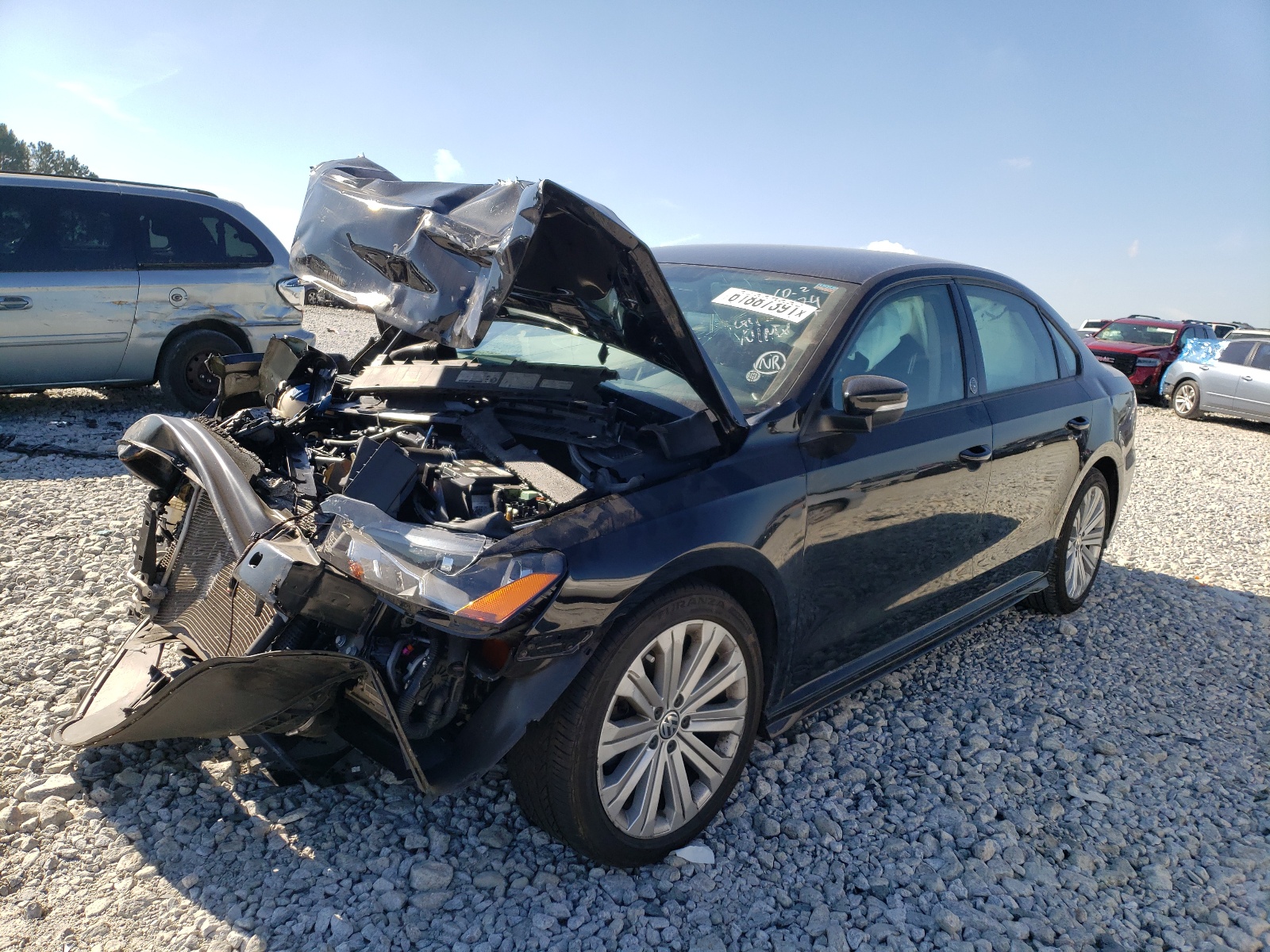 Photo 2 from auction – 2015 VOLKSWAGEN PASSAT S with VIN 1VWAT7A36FC047874