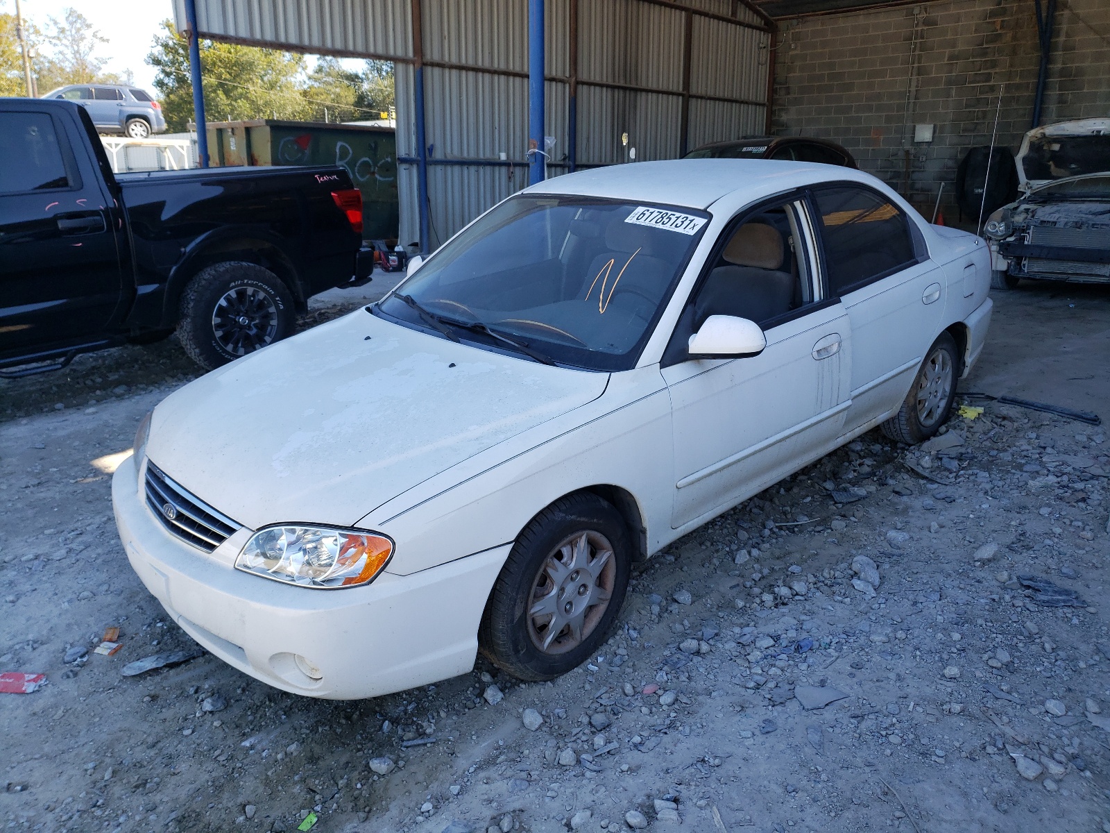 Photo 2 from auction – 2002 KIA SPECTRA BA with VIN KNAFB121325129918