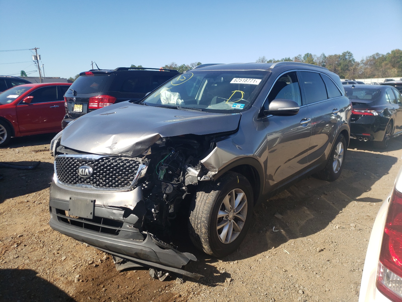 Photo 2 from auction – 2016 KIA SORENTO LX with VIN 5XYPG4A39GG117364
