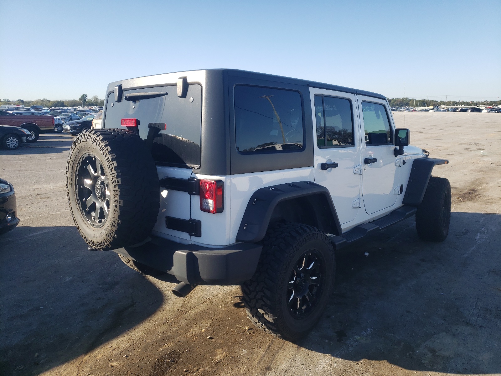 Photo 4 from auction – 2016 JEEP WRANGLER U with VIN 1C4BJWDG0GL188513