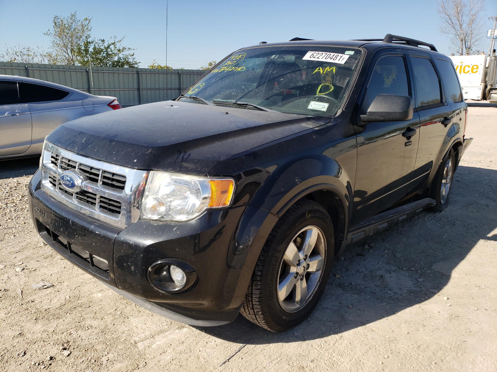 Photo 2 from auction – 2011 FORD ESCAPE with VIN 1FMCU0D72BKB42040