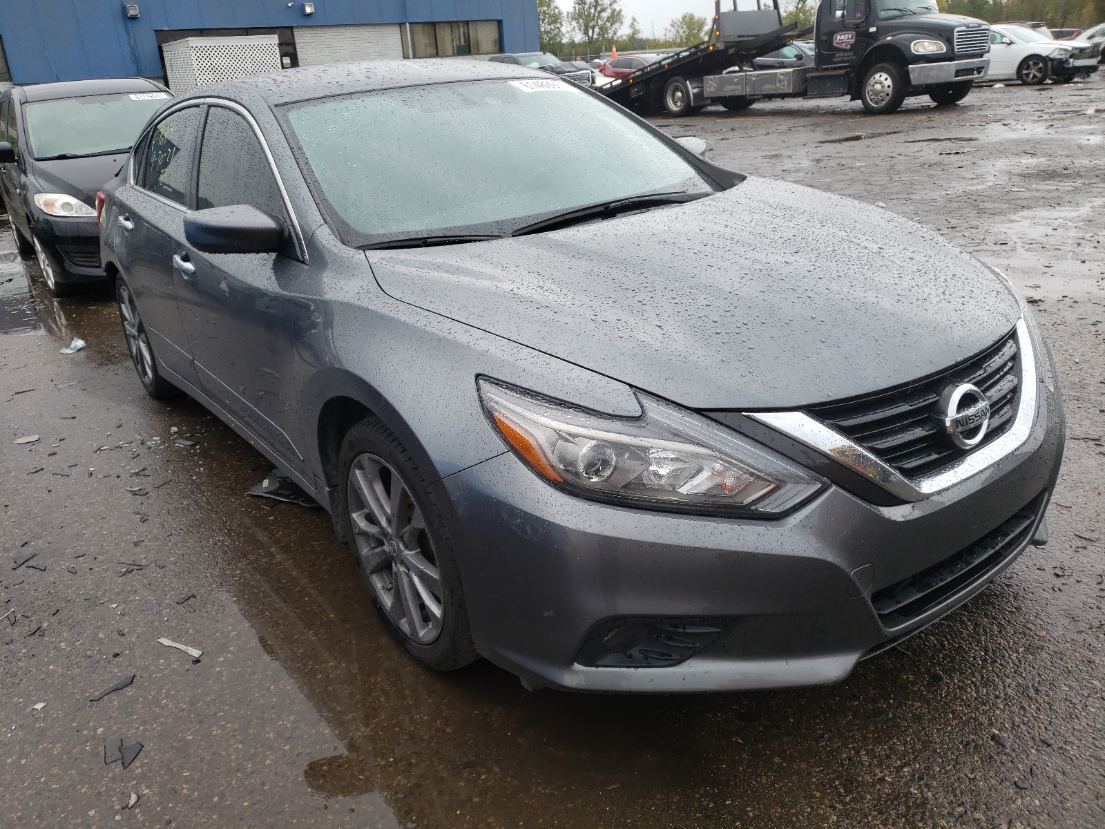 NISSAN ALTIMA 2.5 2018 with VIN 1N4AL3AP8JC152672 - Photo from auction