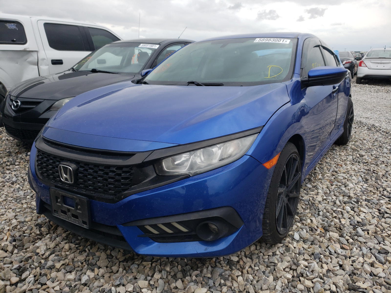 Photo 2 from auction – 2016 HONDA CIVIC LX with VIN 2HGFC2F52GH560044
