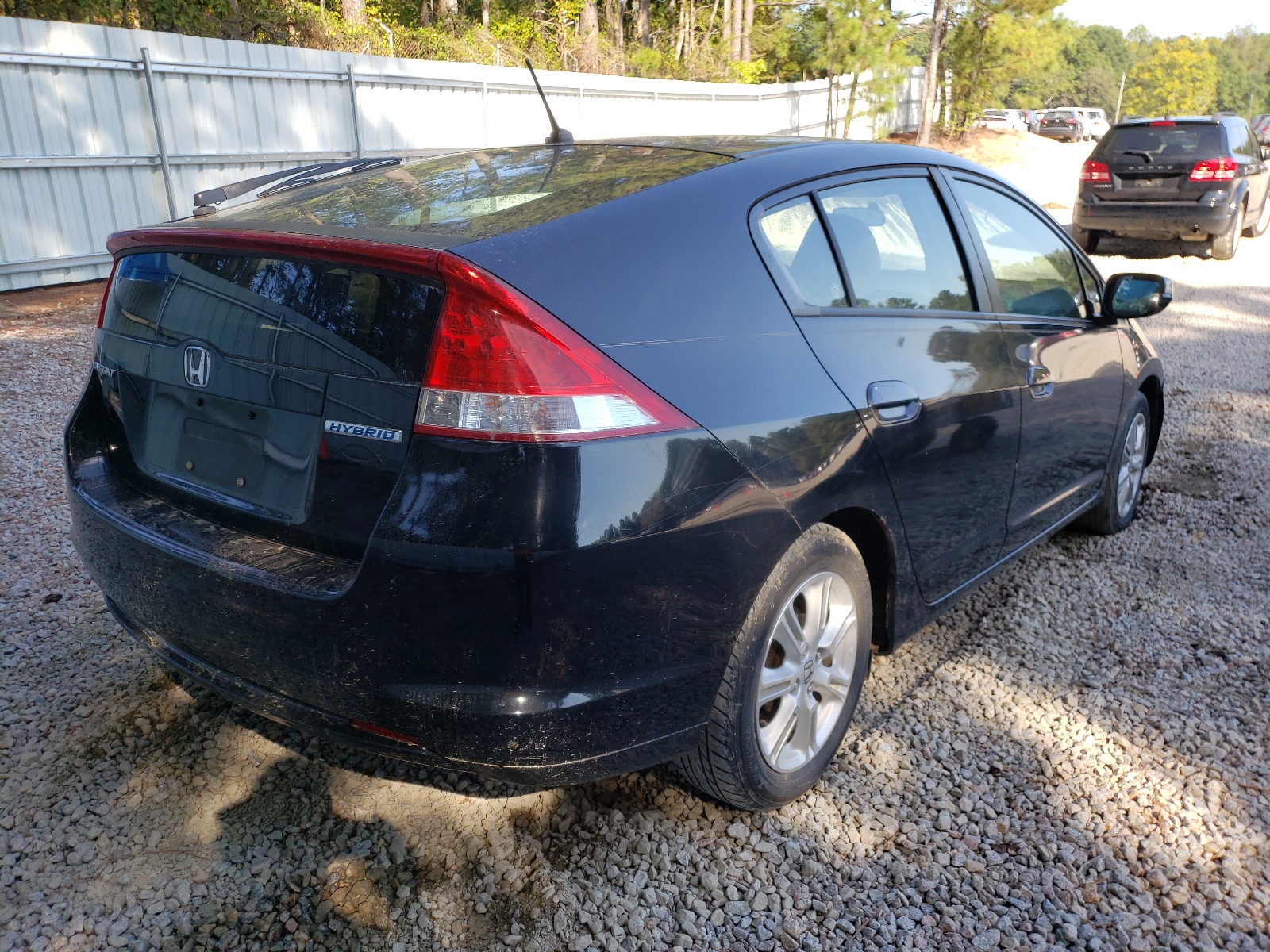 Photo 4 from auction – 2010 HONDA INSIGHT EX with VIN JHMZE2H7XAS041133