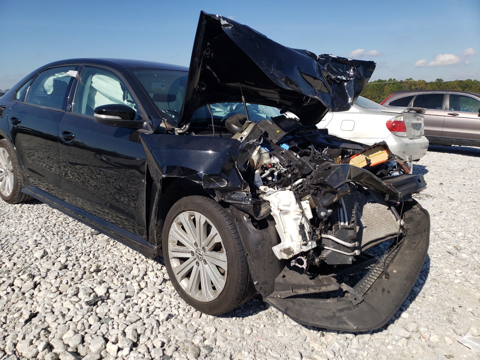 Photo 9 from auction – 2015 VOLKSWAGEN PASSAT S with VIN 1VWAT7A36FC047874