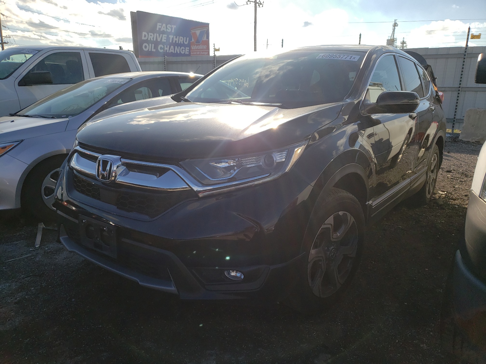 Photo 2 from auction – 2018 HONDA CR-V EX with VIN 7FARW2H54JE030479