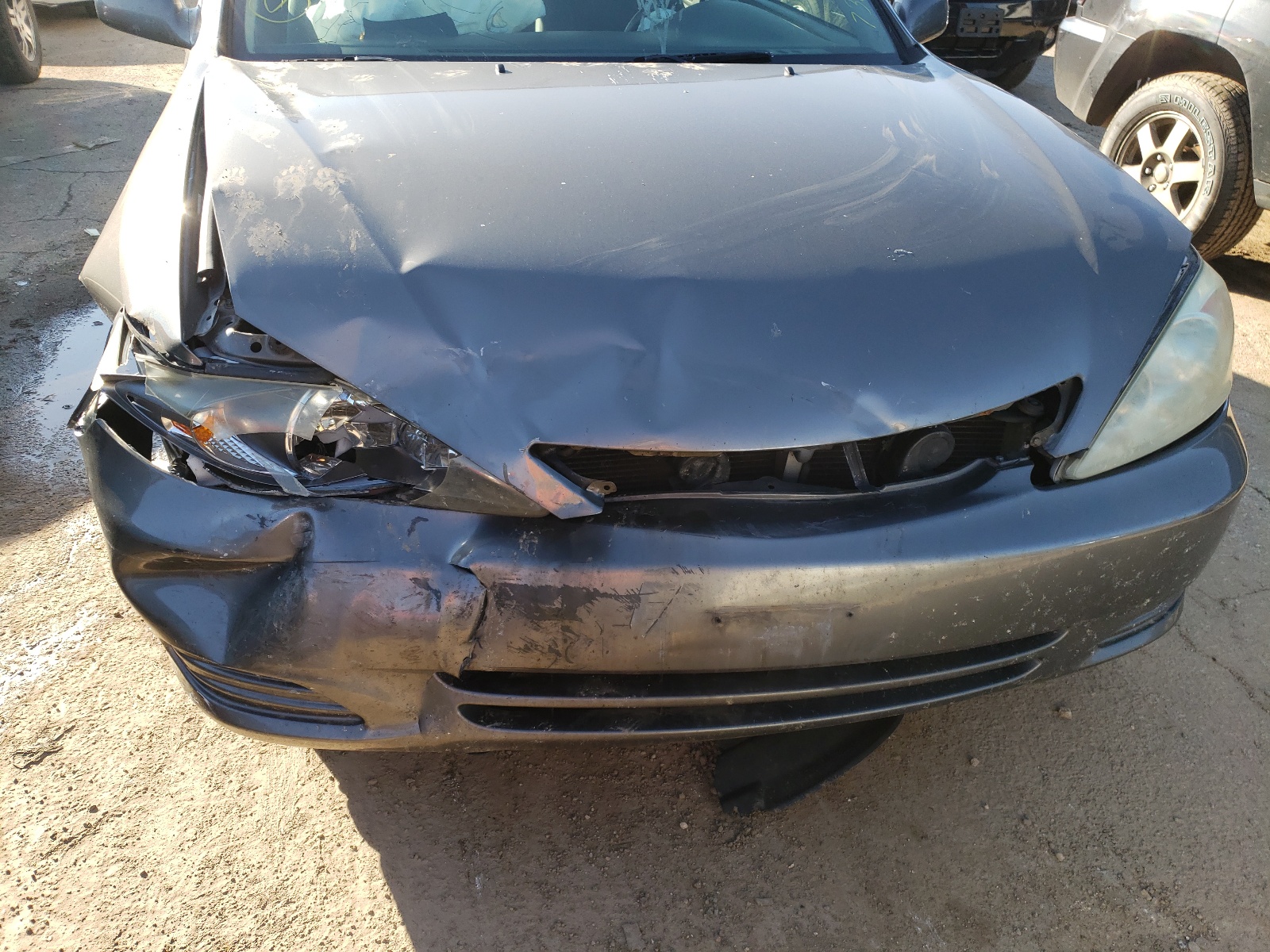 Photo 9 from auction – 2003 TOYOTA CAMRY LE with VIN 4T1BE32KX3U732624