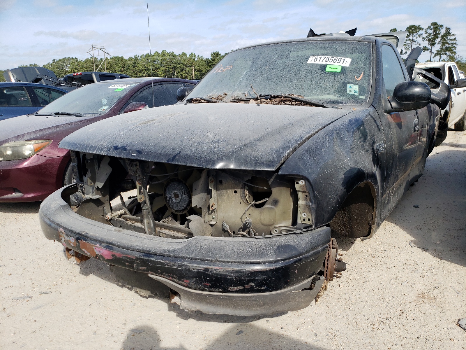 Photo 2 from auction – 2003 FORD F150 with VIN 1FTRF17273NA61985