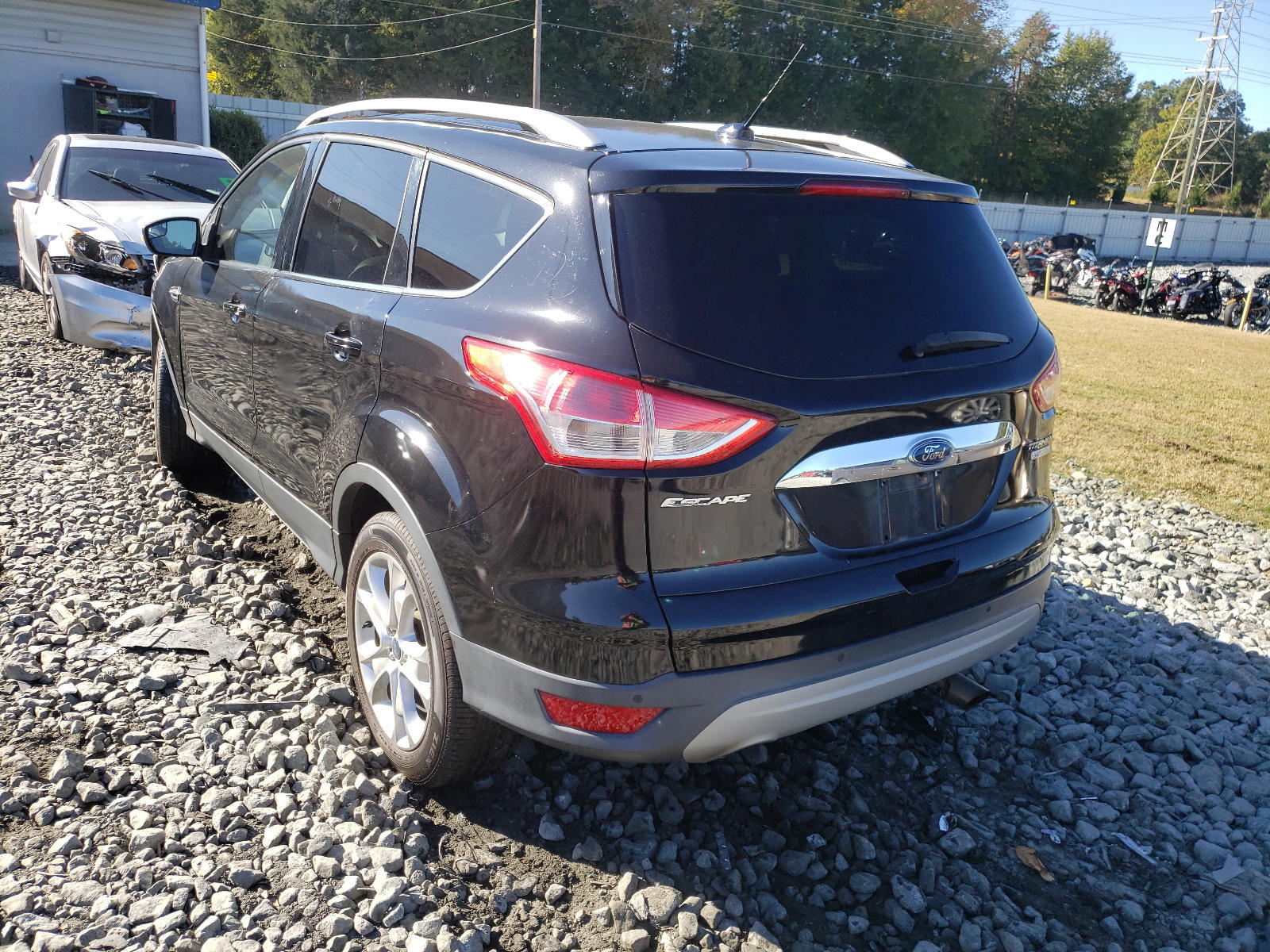 Photo 3 from auction – 2016 FORD ESCAPE TIT with VIN 1FMCU0J98GUB19640