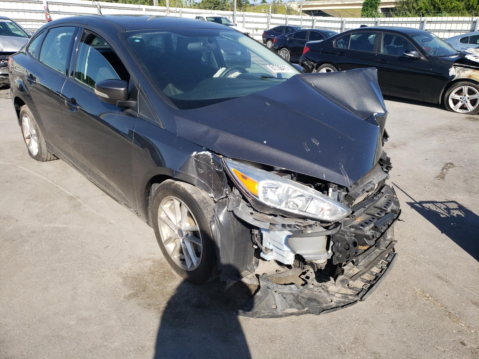 FORD FOCUS SE 2017 with VIN 1FADP3F2XHL227994 - Photo from auction