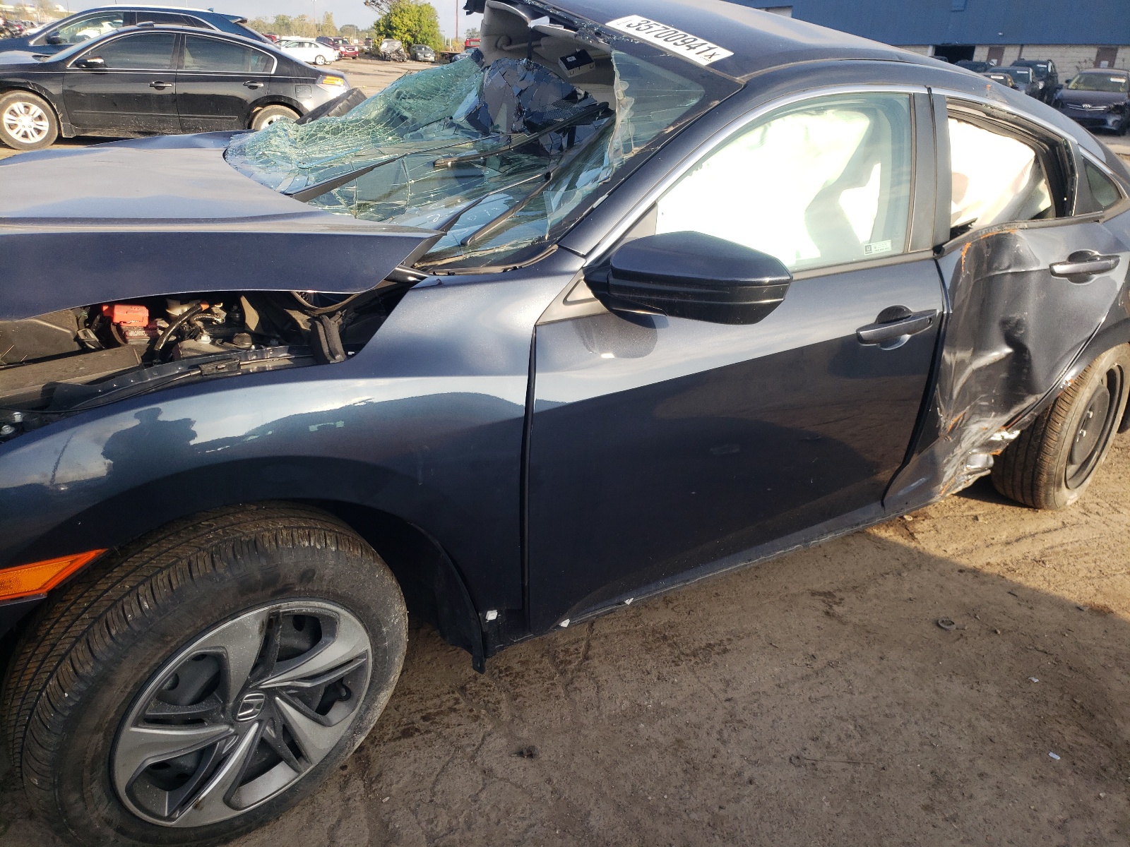 Photo 9 from auction – 2019 HONDA CIVIC LX with VIN 2HGFC2F6XKH553635