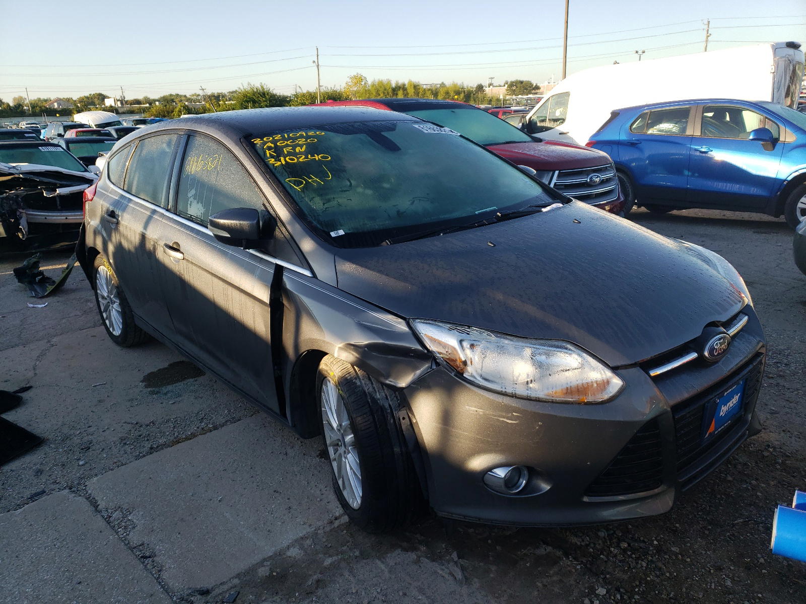 FORD FOCUS SEL 2012 with VIN 1FAHP3M29CL370240 - Photo from auction