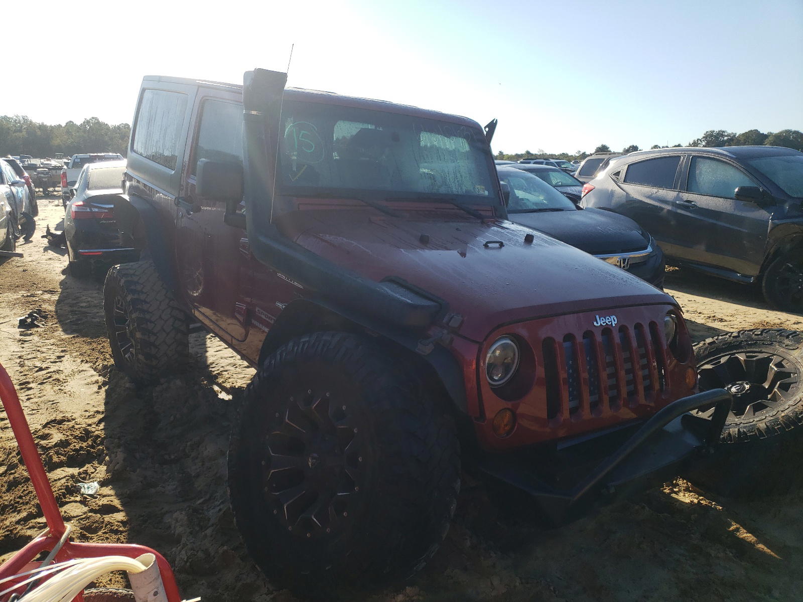 JEEP WRANGLER S 2011 with VIN 1J4AA2D13BL574295 - Photo from auction