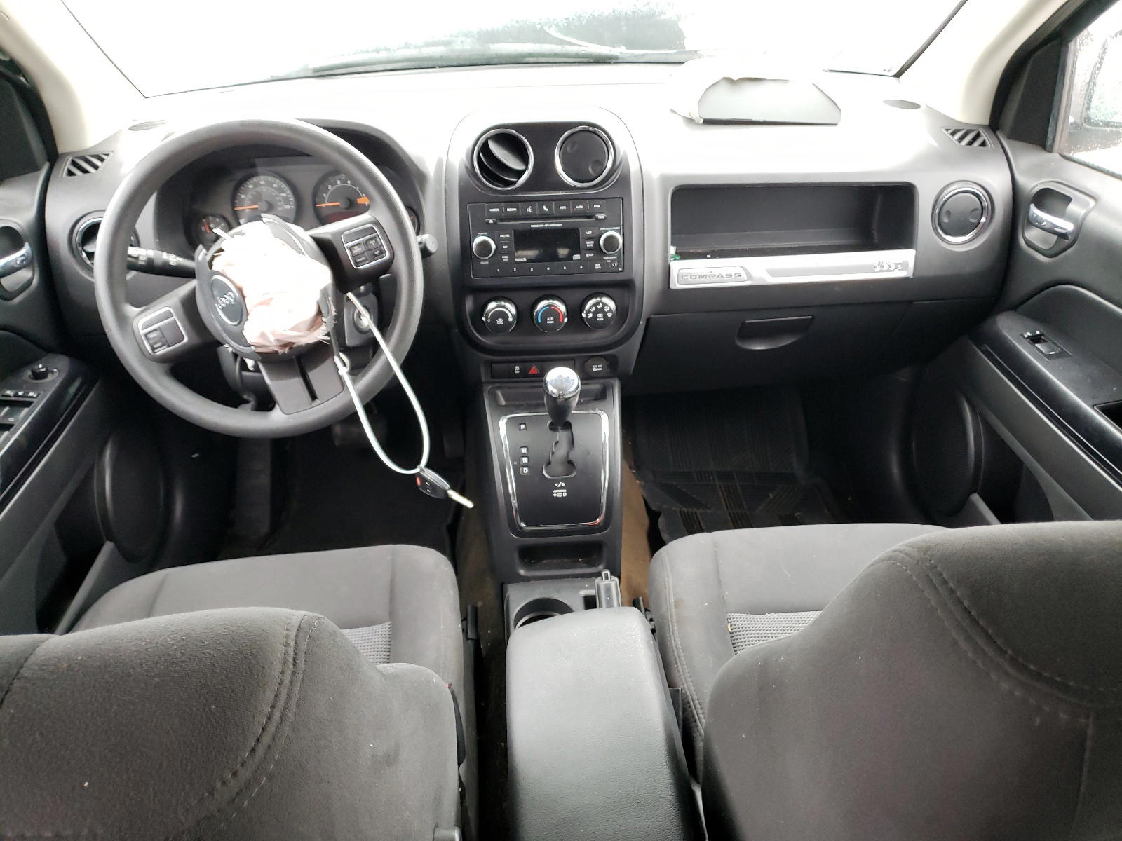 Photo 9 from auction – 2016 JEEP COMPASS SP with VIN 1C4NJDBB1GD631609