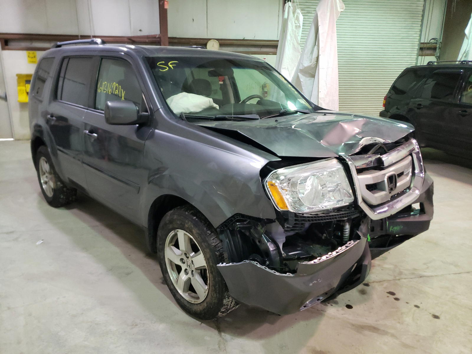 HONDA PILOT EX 2011 with VIN 5FNYF4H43BB102560 - Photo from auction