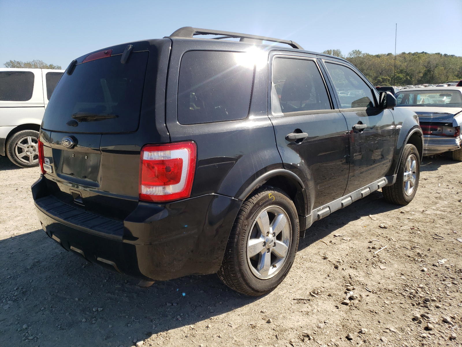 Photo 4 from auction – 2011 FORD ESCAPE with VIN 1FMCU0D72BKB42040