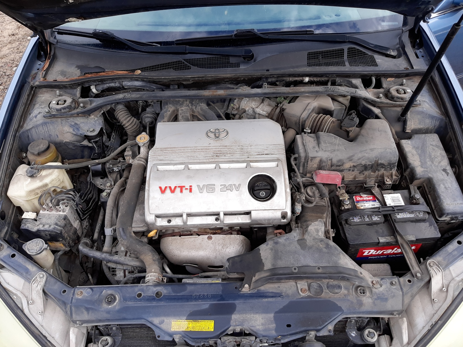 Photo 7 from auction – 2004 TOYOTA CAMRY LE with VIN 4T1BF30KX4U568146
