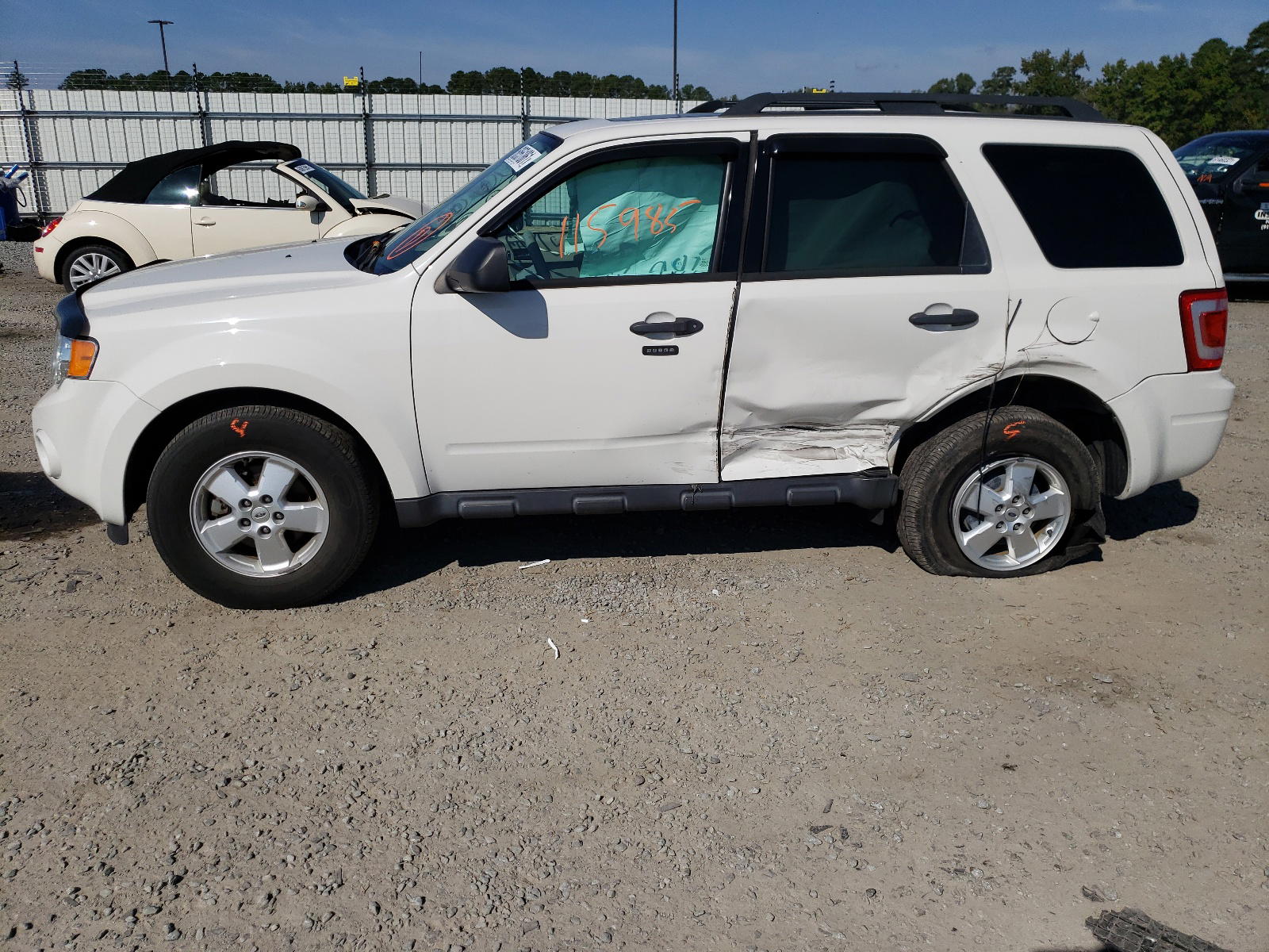 Photo 9 from auction – 2012 FORD ESCAPE XLT with VIN 1FMCU0DG1CKC76992