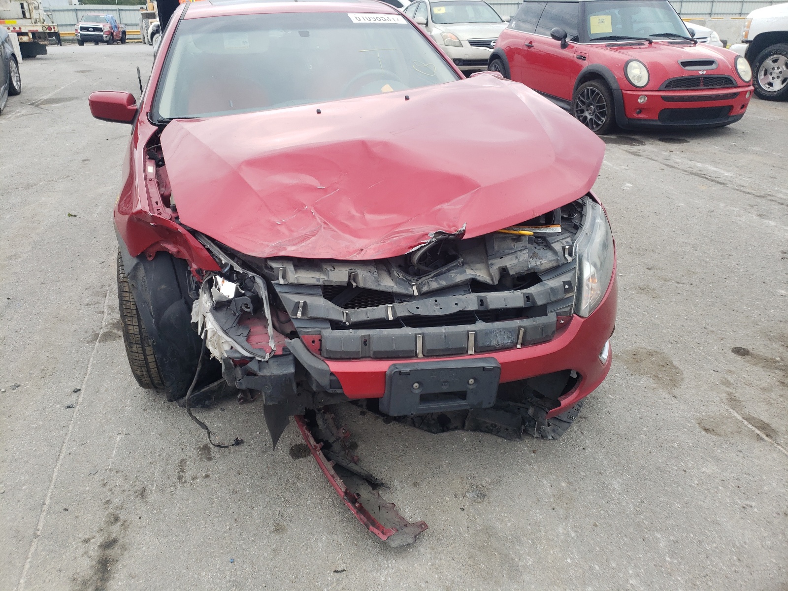 Photo 9 from auction – 2012 FORD FUSION HYB with VIN 3FADP0L36CR320338