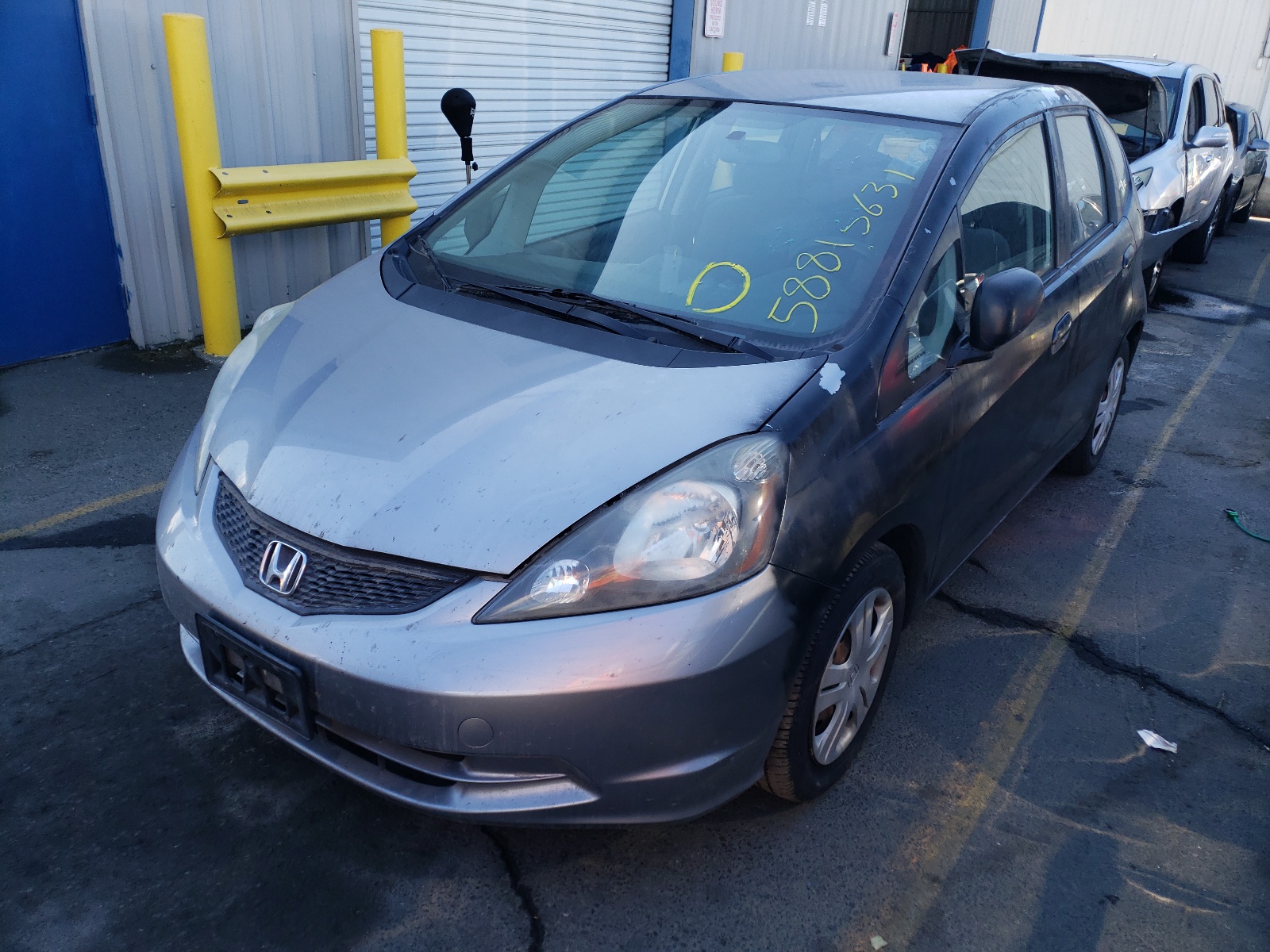 Photo 2 from auction – 2009 HONDA FIT with VIN JHMGE88219S050152