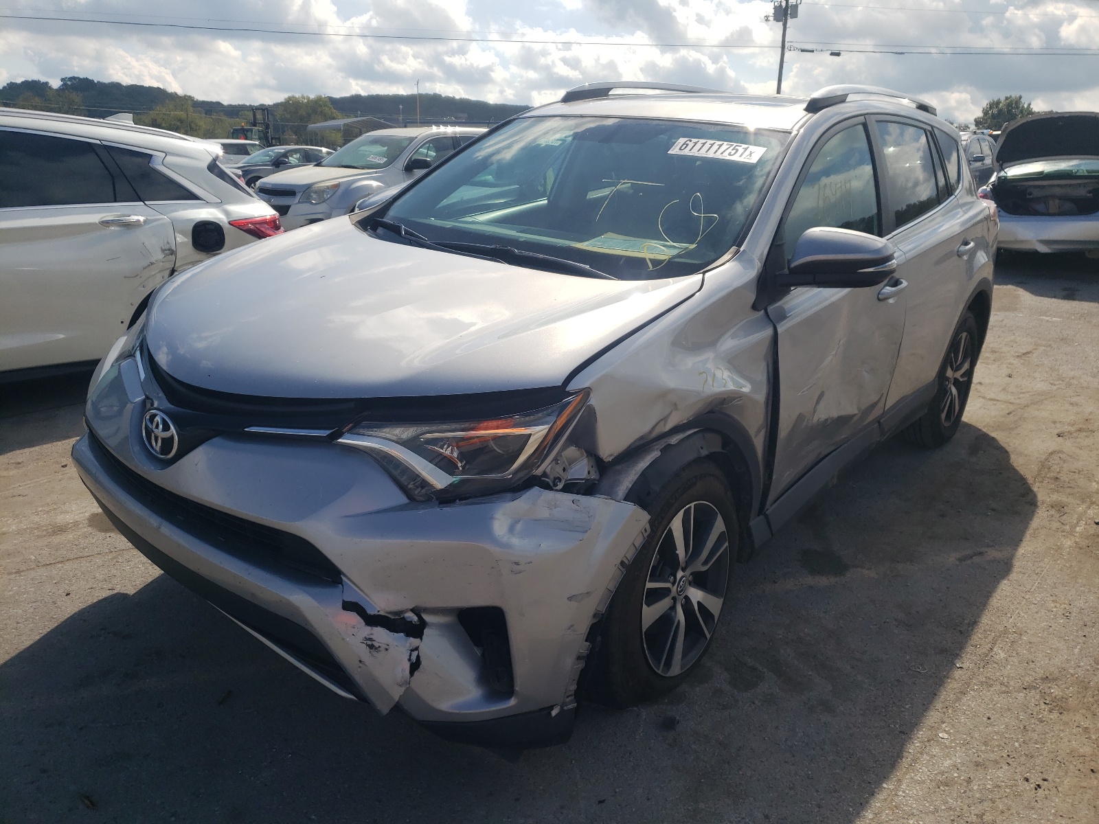 Photo 2 from auction – 2016 TOYOTA RAV4 XLE with VIN 2T3WFREV9GW295753