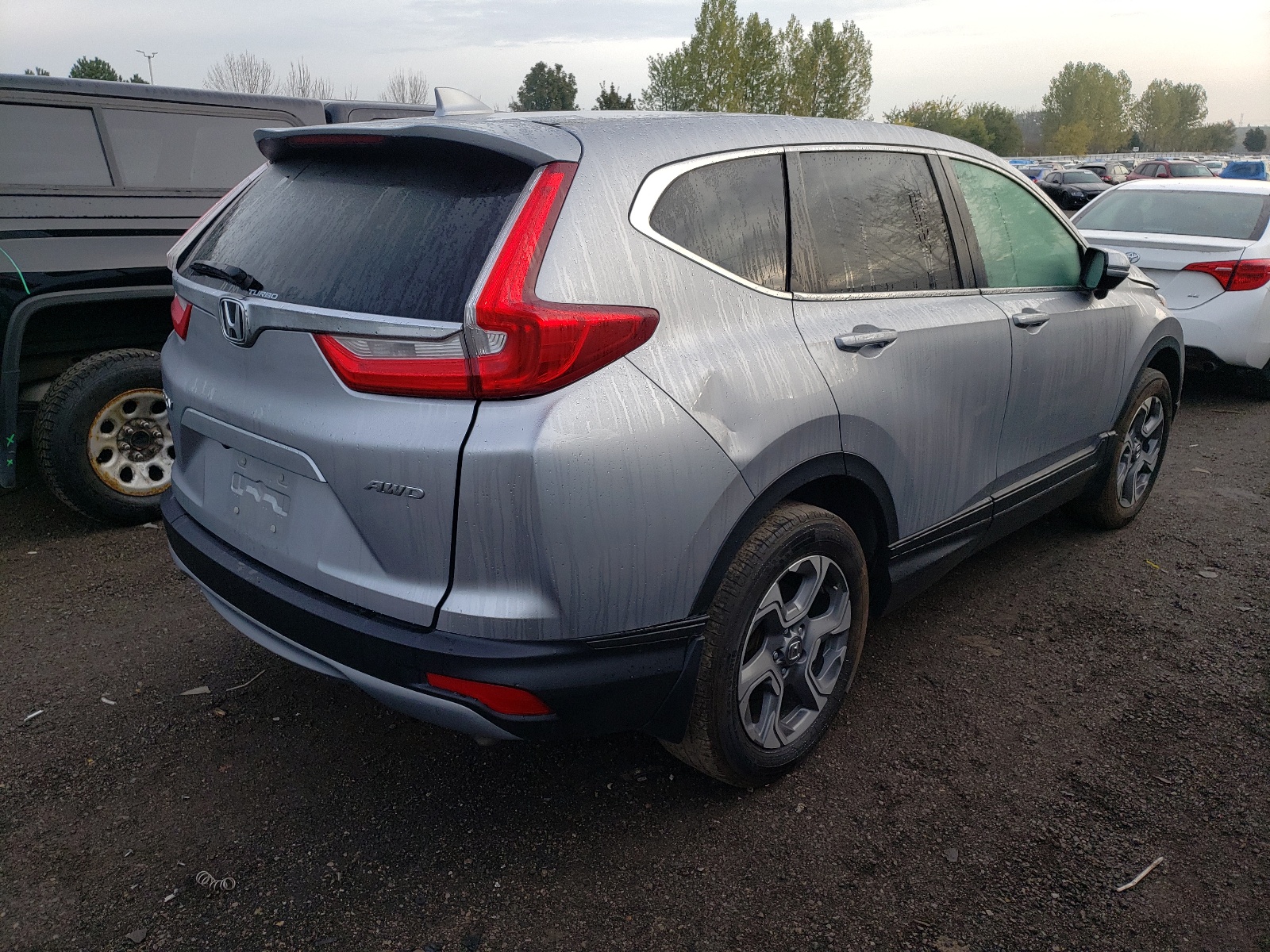 Photo 4 from auction – 2018 HONDA CR-V EX with VIN 2HKRW2H50JH125652